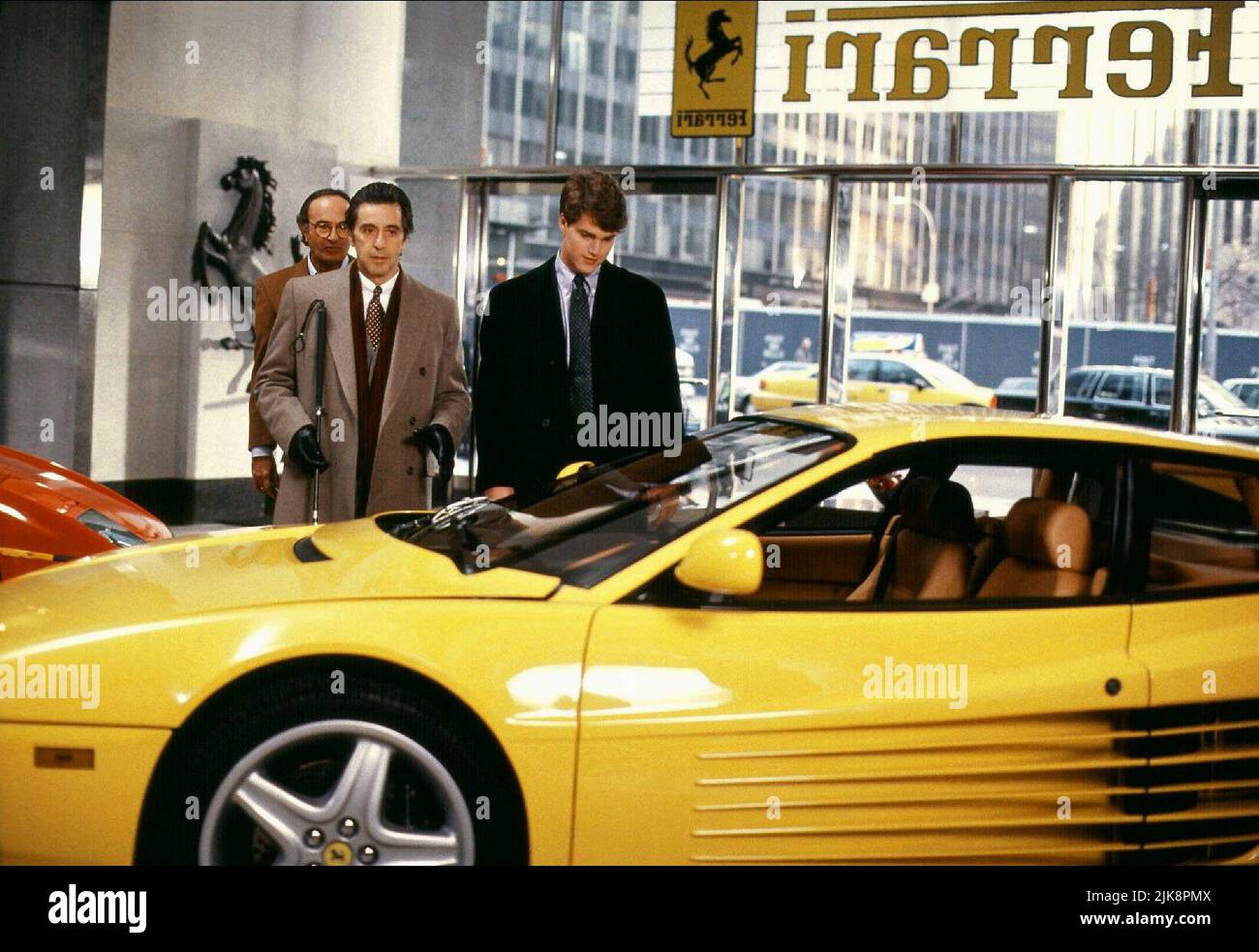 Al Pacino & Chris O'Donnell Film: Scent Of A Woman (USA 1992) Characters: Lieutenant Colonel Frank Slade & Charlie Simms  / Ferrari Testarossa Director: Martin Brest 23 December 1992   **WARNING** This Photograph is for editorial use only and is the copyright of UNIVERSAL and/or the Photographer assigned by the Film or Production Company and can only be reproduced by publications in conjunction with the promotion of the above Film. A Mandatory Credit To UNIVERSAL is required. The Photographer should also be credited when known. No commercial use can be granted without written authority from th Stock Photo
