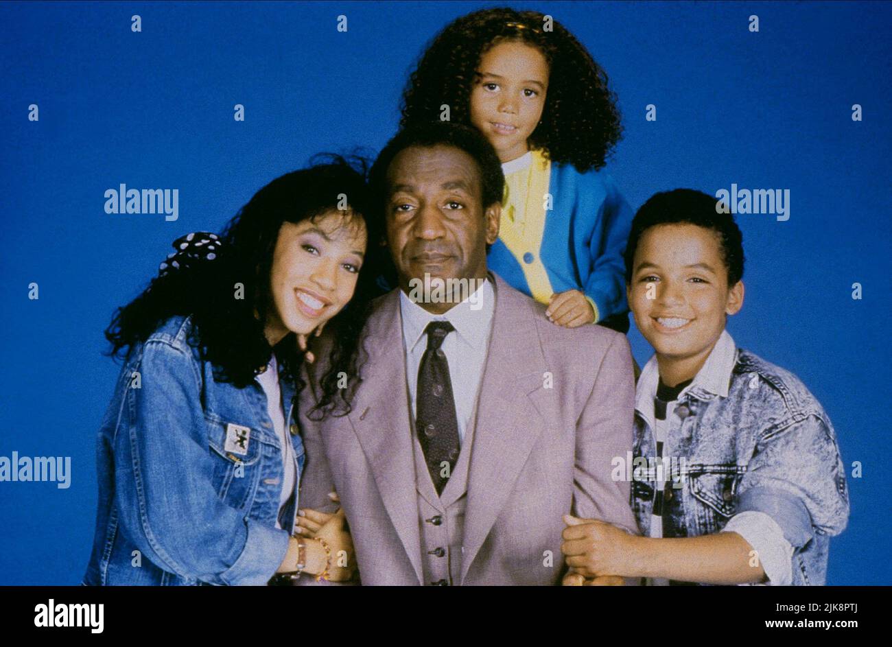 Kimberly Russell, Bill Cosby, Brooke Fontaine, Salim Grant Film: Ghost Dad (USA 1990) Characters: ,Elliot Hopper,Amanda Hopper,Daniel 'Danny' Hopper  Director: Sidney Poitier 29 June 1990   **WARNING** This Photograph is for editorial use only and is the copyright of UNIVERSAL and/or the Photographer assigned by the Film or Production Company and can only be reproduced by publications in conjunction with the promotion of the above Film. A Mandatory Credit To UNIVERSAL is required. The Photographer should also be credited when known. No commercial use can be granted without written authority fr Stock Photo