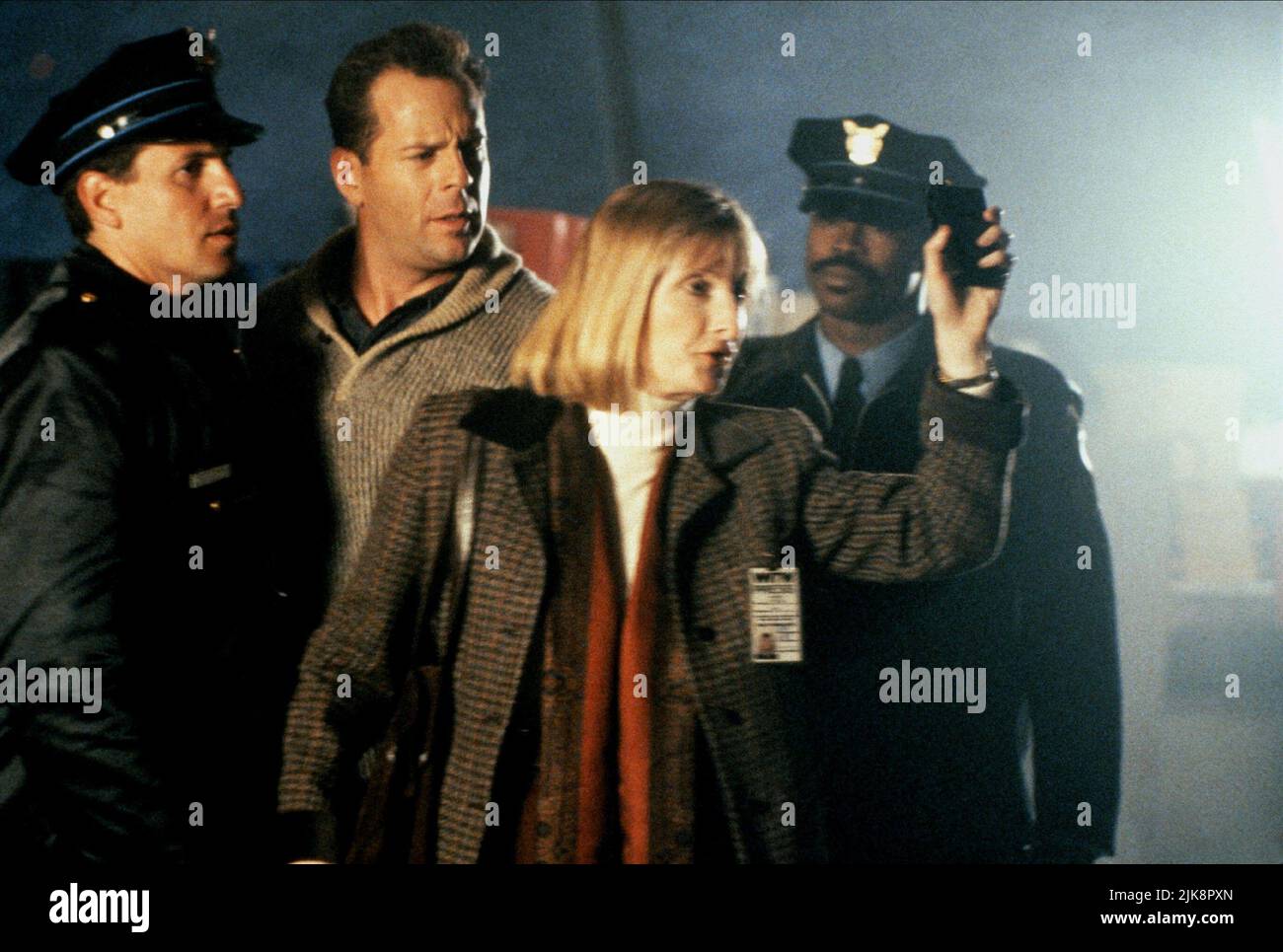 Bruce Willis & Sheila Mccarthy Film: Die Hard 2; Die Hard 2: Die Harder (USA 1990) Characters: John McClane & Samantha 'Sam' Coleman  Director: Renny Harlin 02 July 1990   **WARNING** This Photograph is for editorial use only and is the copyright of 20TH CENTURY FOX and/or the Photographer assigned by the Film or Production Company and can only be reproduced by publications in conjunction with the promotion of the above Film. A Mandatory Credit To 20TH CENTURY FOX is required. The Photographer should also be credited when known. No commercial use can be granted without written authority from t Stock Photo