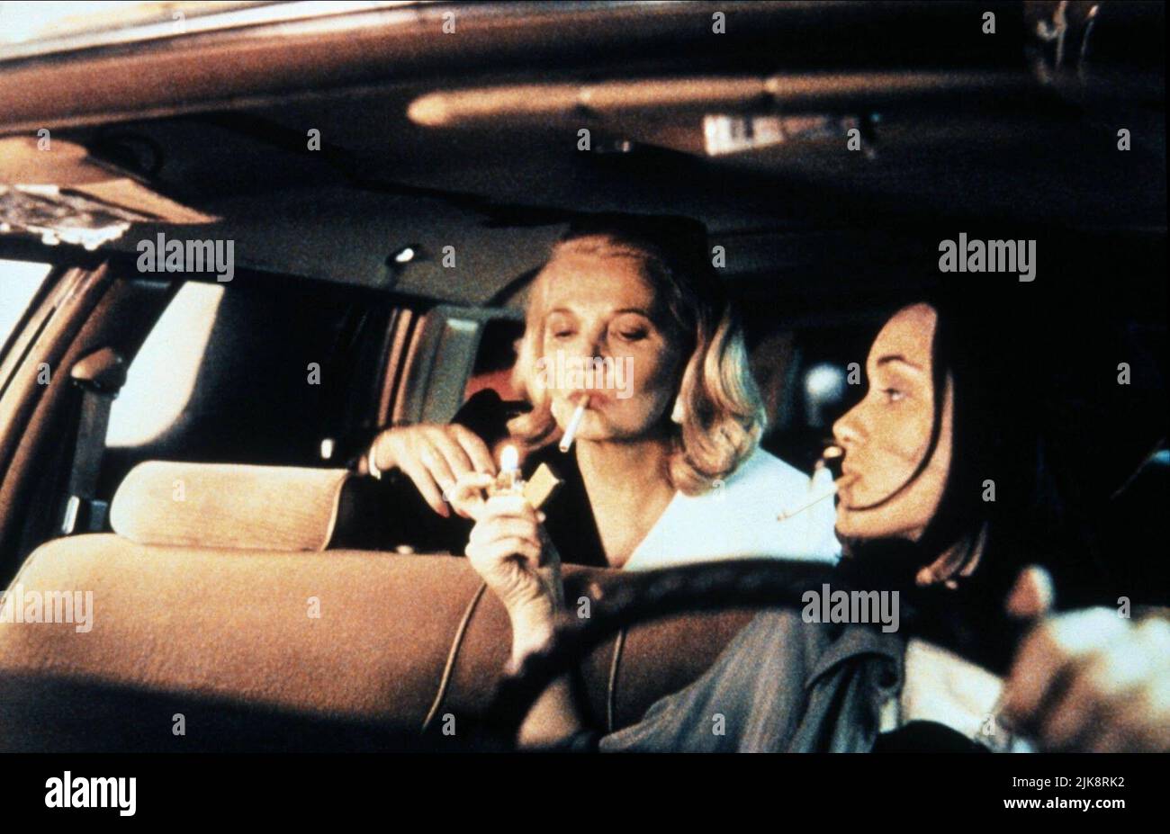 Gena Rowlands & Winona Ryder Film: Night On Earth (UK/USA/FR/JP/DE 1991) Characters: Victoria Snelling & Corky  Director: Jim Jarmusch 04 October 1991   **WARNING** This Photograph is for editorial use only and is the copyright of CHANNEL FOUR FILMS and/or the Photographer assigned by the Film or Production Company and can only be reproduced by publications in conjunction with the promotion of the above Film. A Mandatory Credit To CHANNEL FOUR FILMS is required. The Photographer should also be credited when known. No commercial use can be granted without written authority from the Film Company Stock Photo