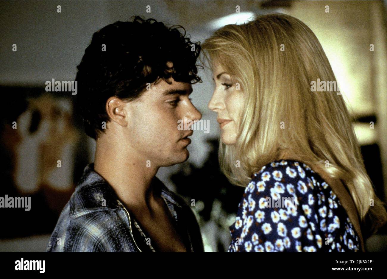 Michael D Arenz, Shannon Tweed Film: A Woman Scorned; Scorned (USA/CAN 1994) Characters: ,Patricia Langley / Amanda Chessfield  Director: Andrew Stevens 13 July 1994   **WARNING** This Photograph is for editorial use only and is the copyright of PRISM PICTURES and/or the Photographer assigned by the Film or Production Company and can only be reproduced by publications in conjunction with the promotion of the above Film. A Mandatory Credit To PRISM PICTURES is required. The Photographer should also be credited when known. No commercial use can be granted without written authority from the Film Stock Photo