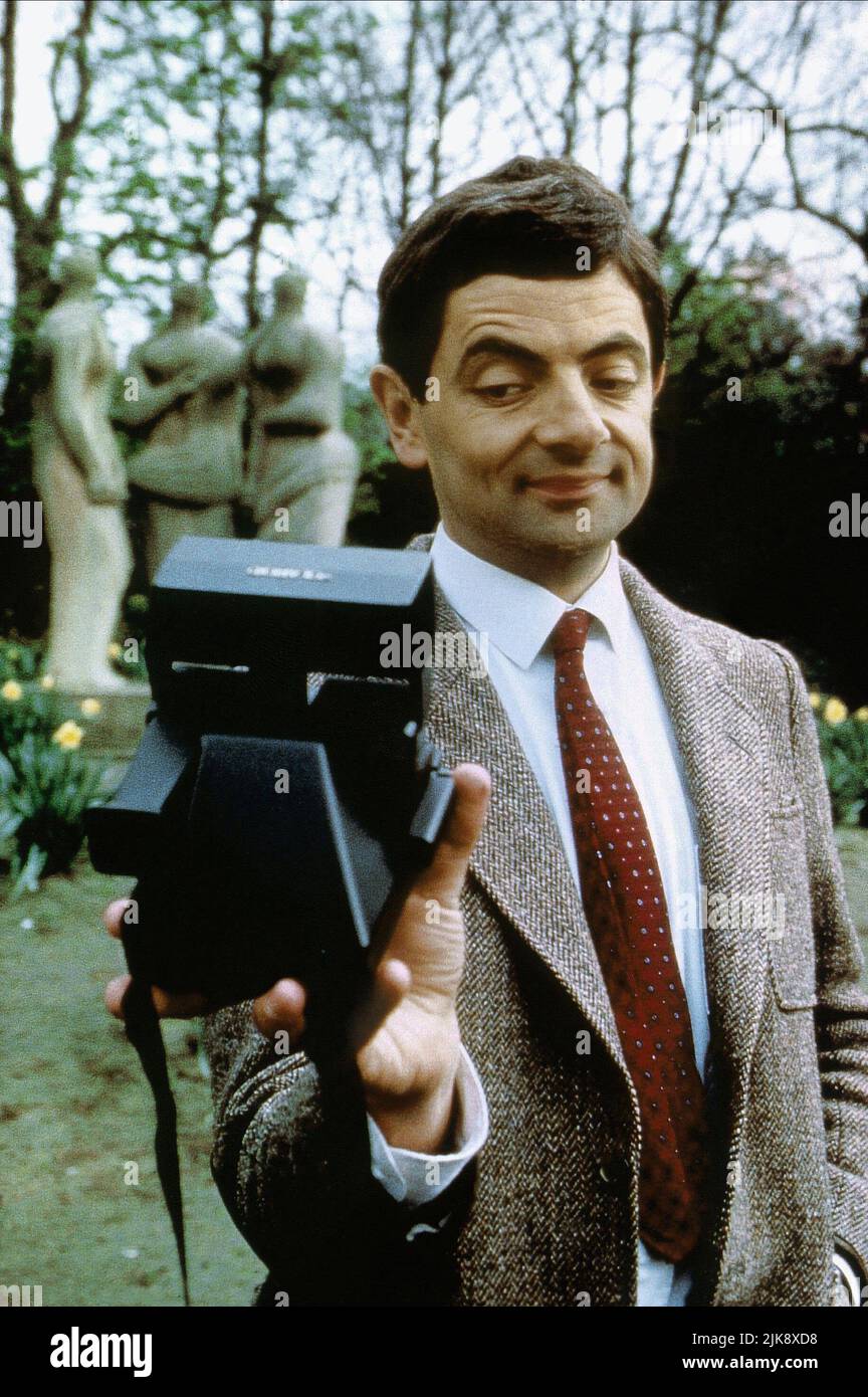 Rowan Atkinson Television: Mr Bean Goes To Town (1990)  To Be Used Solely For Coverage Of This Specific Motion Picture. 01 January 1990   **WARNING** This Photograph is for editorial use only and is the copyright of TIGER ASPECT and/or the Photographer assigned by the Film or Production Company and can only be reproduced by publications in conjunction with the promotion of the above Film. A Mandatory Credit To TIGER ASPECT is required. The Photographer should also be credited when known. No commercial use can be granted without written authority from the Film Company. Stock Photo