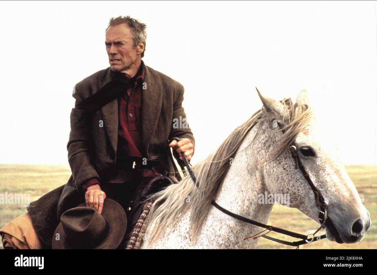 Clint Eastwood Film: Unforgiven (USA 1992) Characters: William 'Bill' Munny  Director: Clint Eastwood 03 August 1992   **WARNING** This Photograph is for editorial use only and is the copyright of WARNER BROS. and/or the Photographer assigned by the Film or Production Company and can only be reproduced by publications in conjunction with the promotion of the above Film. A Mandatory Credit To WARNER BROS. is required. The Photographer should also be credited when known. No commercial use can be granted without written authority from the Film Company. Stock Photo