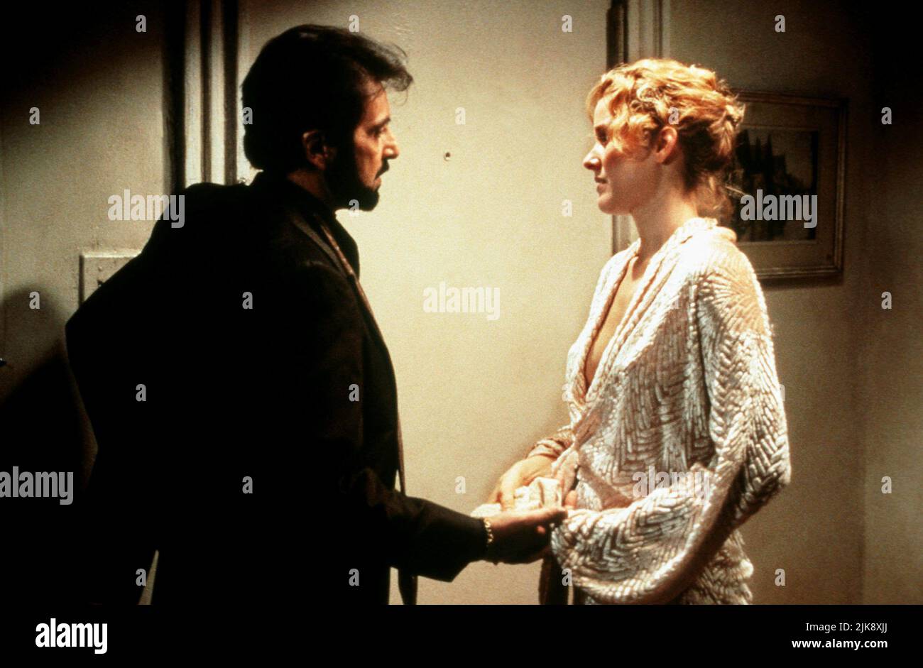 Al Pacino & Penelope Ann Miller Film: Carlito'S Way (1993) Characters: Carlito 'Charlie' Brigante & Gail  01 August 1993   **WARNING** This Photograph is for editorial use only and is the copyright of UNIVERAL and/or the Photographer assigned by the Film or Production Company and can only be reproduced by publications in conjunction with the promotion of the above Film. A Mandatory Credit To UNIVERAL is required. The Photographer should also be credited when known. No commercial use can be granted without written authority from the Film Company. Stock Photo