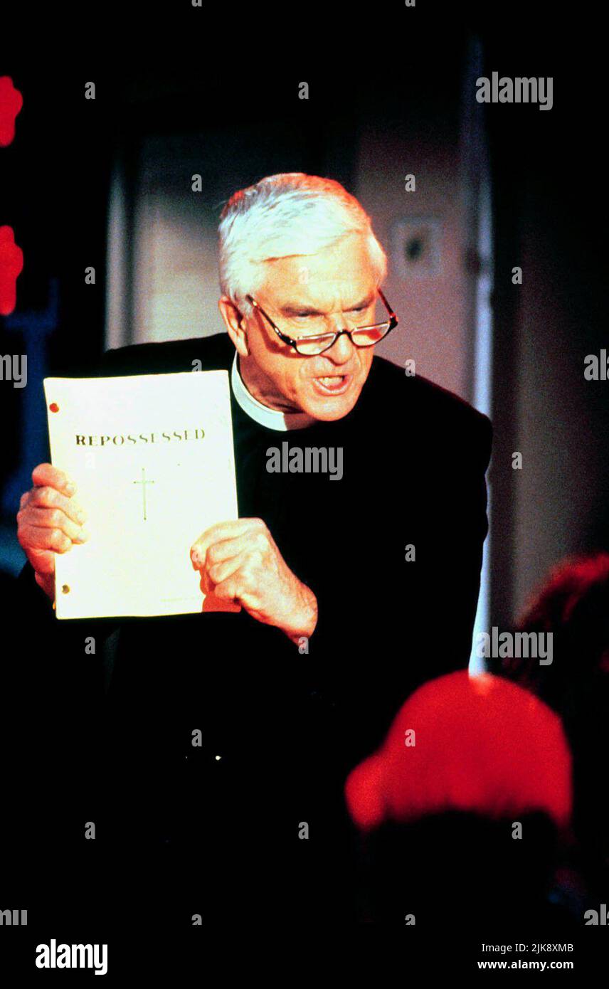 Leslie Nielson  Film Repossessed (1992)   Director: Bob Logan 14 September 1990   **WARNING** This Photograph is for editorial use only and is the copyright of CAROLCO PITURES INC and/or the Photographer assigned by the  Film or Production Company and can only be reproduced by publications in conjunction with the promotion of the above  Film. A Mandatory Credit To CAROLCO PITURES INC is required. The Photographer should also be credited when known. No commercial use can be granted without written authority from the  Film Company. Stock Photo