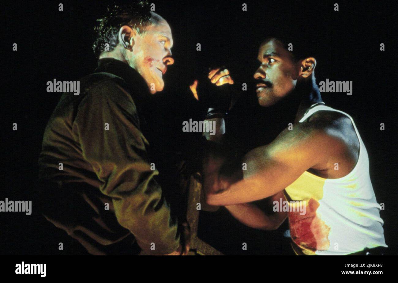 John Lithgow & Denzel Washington Film: Ricochet (1991) Characters: Blake & Nick Styles  Director: Russell Mulcahy 04 October 1991   **WARNING** This Photograph is for editorial use only and is the copyright of SILVER FILM and/or the Photographer assigned by the Film or Production Company and can only be reproduced by publications in conjunction with the promotion of the above Film. A Mandatory Credit To SILVER FILM is required. The Photographer should also be credited when known. No commercial use can be granted without written authority from the Film Company. Stock Photo