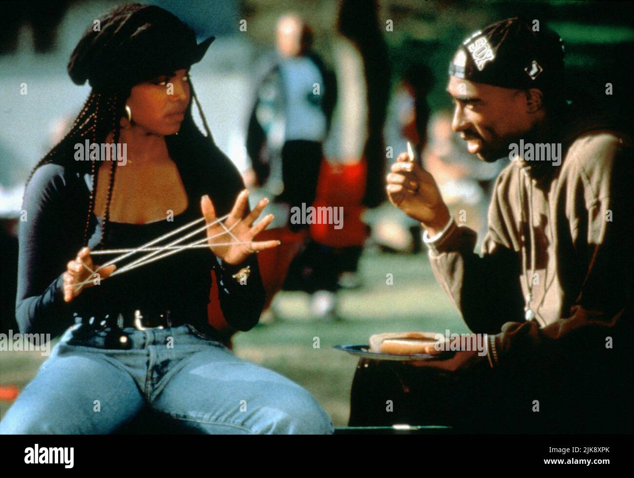 Janet Jackson & Tupac Shakur Film: Poetic Justice (USA 1993) Characters: Justice & Lucky  Director: John Singleton 23 July 1993   **WARNING** This Photograph is for editorial use only and is the copyright of COLUMBIA and/or the Photographer assigned by the Film or Production Company and can only be reproduced by publications in conjunction with the promotion of the above Film. A Mandatory Credit To COLUMBIA is required. The Photographer should also be credited when known. No commercial use can be granted without written authority from the Film Company. Stock Photo