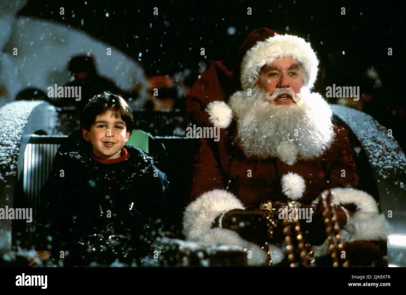 Eric Lloyd & Tim Allen Film: The Santa Clause (USA 1994) Characters: & Scott Calvin  Director: John Pasquin 11 November 1994   **WARNING** This Photograph is for editorial use only and is the copyright of DISNEY and/or the Photographer assigned by the Film or Production Company and can only be reproduced by publications in conjunction with the promotion of the above Film. A Mandatory Credit To DISNEY is required. The Photographer should also be credited when known. No commercial use can be granted without written authority from the Film Company. Stock Photo