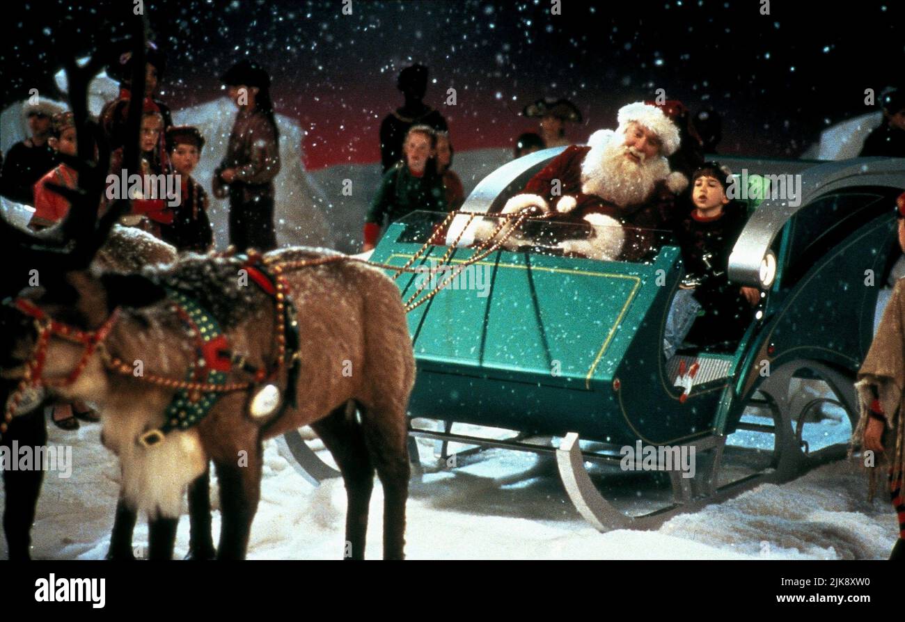 Tim Allen & Eric Lloyd Film: The Santa Clause (USA 1994) Characters: Scott Calvin &  Director: John Pasquin 11 November 1994   **WARNING** This Photograph is for editorial use only and is the copyright of DISNEY and/or the Photographer assigned by the Film or Production Company and can only be reproduced by publications in conjunction with the promotion of the above Film. A Mandatory Credit To DISNEY is required. The Photographer should also be credited when known. No commercial use can be granted without written authority from the Film Company. Stock Photo