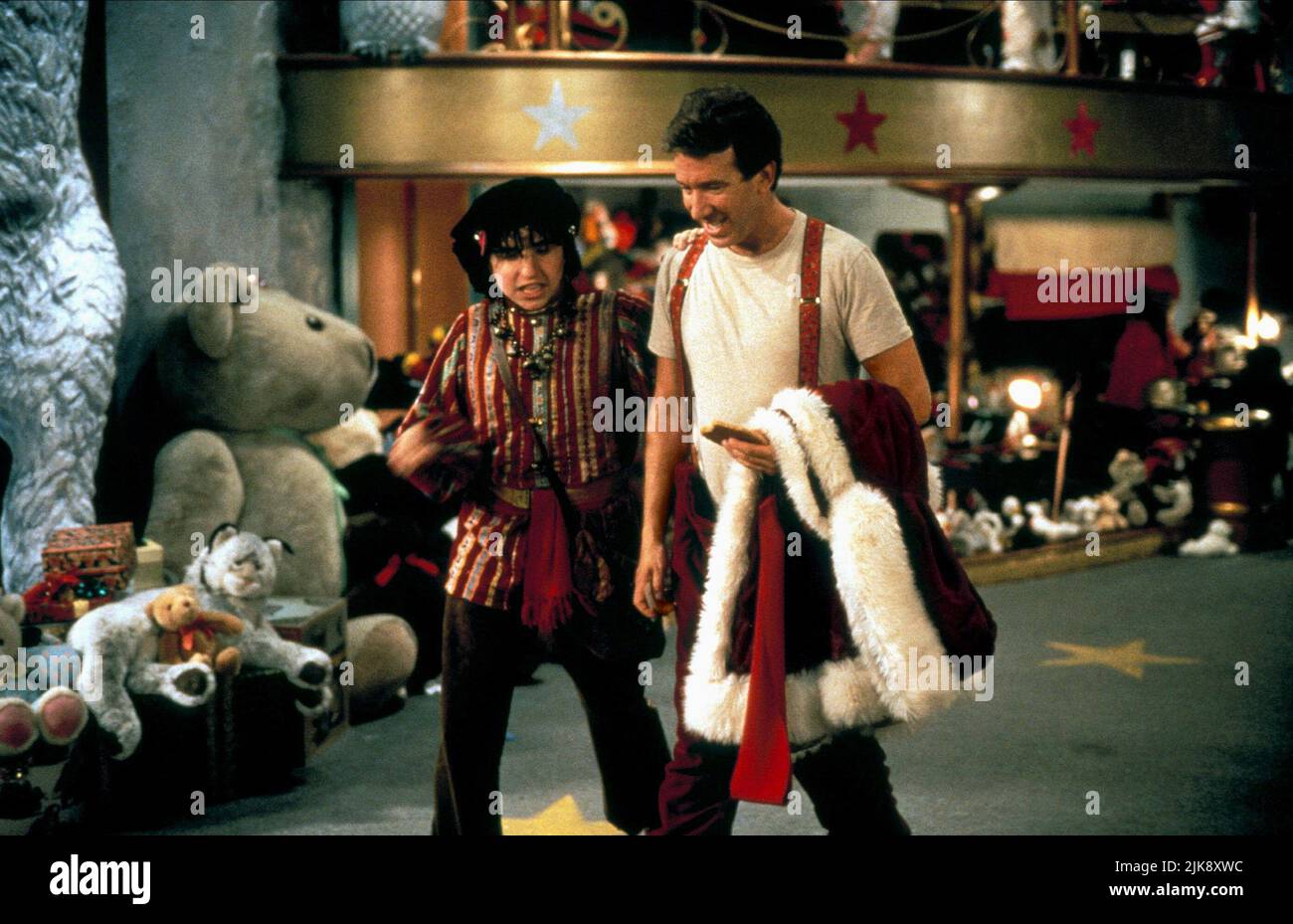 David Krumholtz & Tim Allen Film: The Santa Clause (USA 1994) Characters: Bernard the Elf & Scott Calvin  Director: John Pasquin 11 November 1994   **WARNING** This Photograph is for editorial use only and is the copyright of DISNEY and/or the Photographer assigned by the Film or Production Company and can only be reproduced by publications in conjunction with the promotion of the above Film. A Mandatory Credit To DISNEY is required. The Photographer should also be credited when known. No commercial use can be granted without written authority from the Film Company. Stock Photo