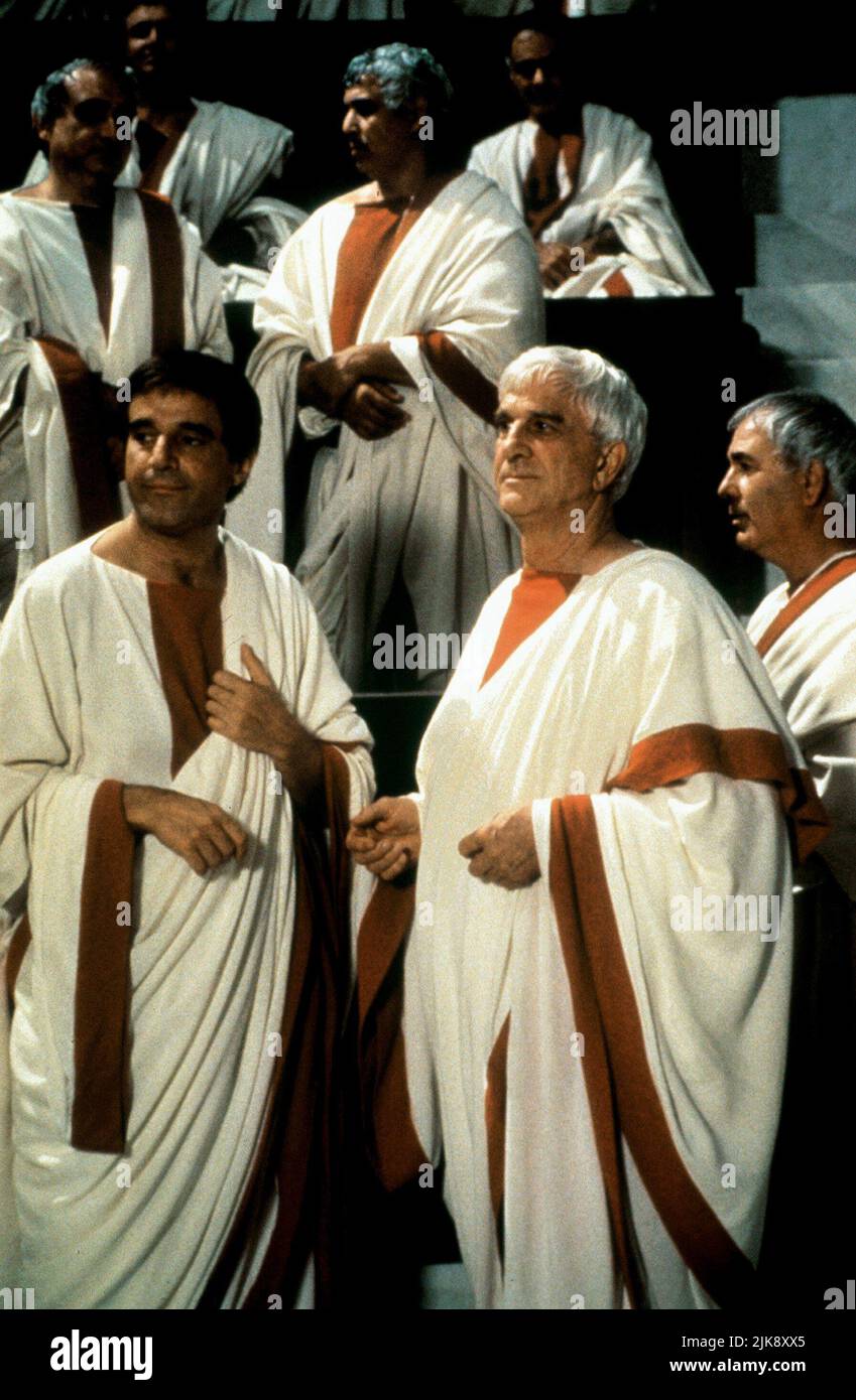 Christian De Sica & Leslie Nielsen Film: Spqr:2000 And A Half Years Ago (1994) Characters: Cesare Atticus & Lucio Cinico  Director: Carlo Vanzina 02 May 1994   **WARNING** This Photograph is for editorial use only and is the copyright of LAUREN FILM and/or the Photographer assigned by the Film or Production Company and can only be reproduced by publications in conjunction with the promotion of the above Film. A Mandatory Credit To LAUREN FILM is required. The Photographer should also be credited when known. No commercial use can be granted without written authority from the Film Company. Stock Photo