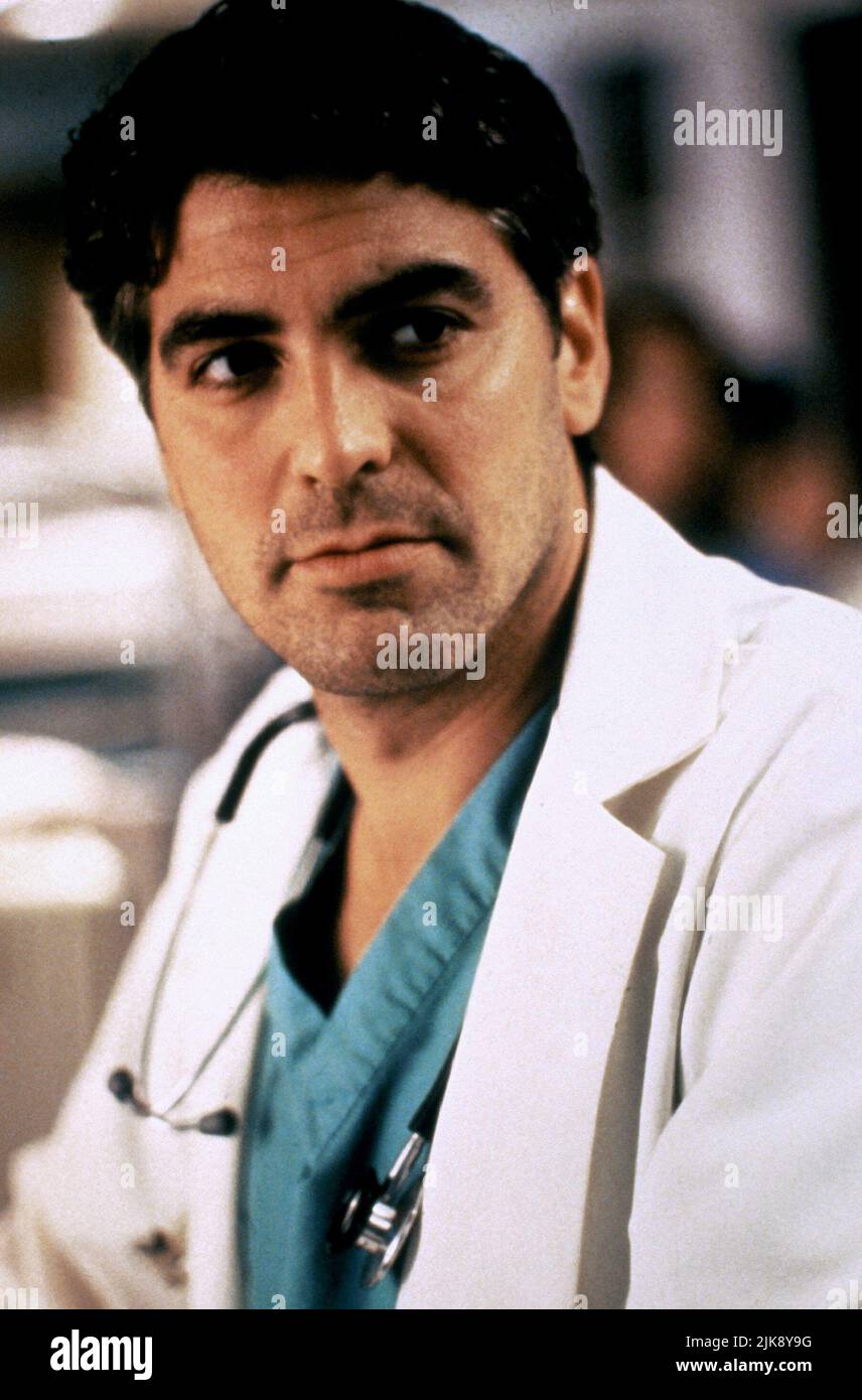 George Clooney Television: Er : Season 1; E.R. (TV-Serie) Characters: Dr. Doug Ross  Usa 1994-2000, / 1. Staffel, Season 1 19 September 1994   **WARNING** This Photograph is for editorial use only and is the copyright of WARNER BROS. TELEVISION and/or the Photographer assigned by the Film or Production Company and can only be reproduced by publications in conjunction with the promotion of the above Film. A Mandatory Credit To WARNER BROS. TELEVISION is required. The Photographer should also be credited when known. No commercial use can be granted without written authority from the Film Company Stock Photo
