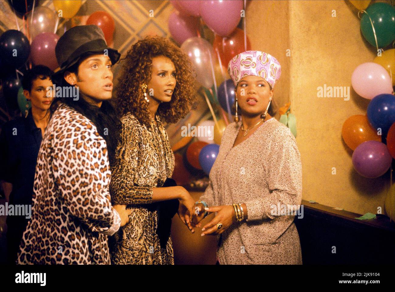 Iman & Queen Latifah Film: House Party 2 (1991) Characters: Sheila Landreaux, Zora  Director: George Jackson & Doug Mchenry 23 October 1991   **WARNING** This Photograph is for editorial use only and is the copyright of NEW LINE CINEMA and/or the Photographer assigned by the Film or Production Company and can only be reproduced by publications in conjunction with the promotion of the above Film. A Mandatory Credit To NEW LINE CINEMA is required. The Photographer should also be credited when known. No commercial use can be granted without written authority from the Film Company. Stock Photo