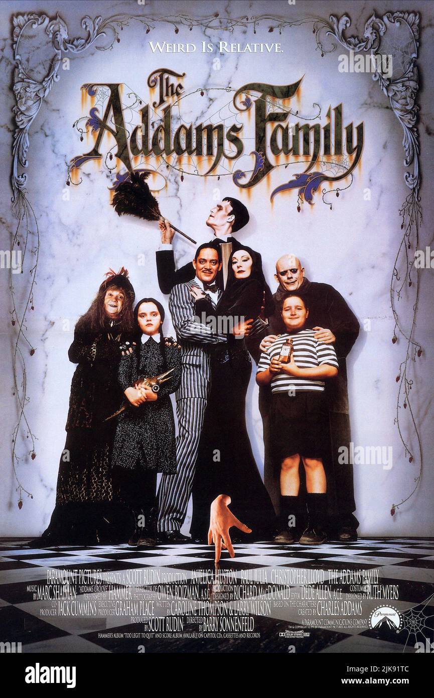 Judith Malina, Christina Ricci, Raul Julia, Carel Struycken, Anjelica Huston, Christopher Lloyd & Jimmy Workman Film: The Addams Family (1991)   Director: Barry Sonnenfeld 22 November 1991   **WARNING** This Photograph is for editorial use only and is the copyright of PARAMOUNT and/or the Photographer assigned by the Film or Production Company and can only be reproduced by publications in conjunction with the promotion of the above Film. A Mandatory Credit To PARAMOUNT is required. The Photographer should also be credited when known. No commercial use can be granted without written authority f Stock Photo
