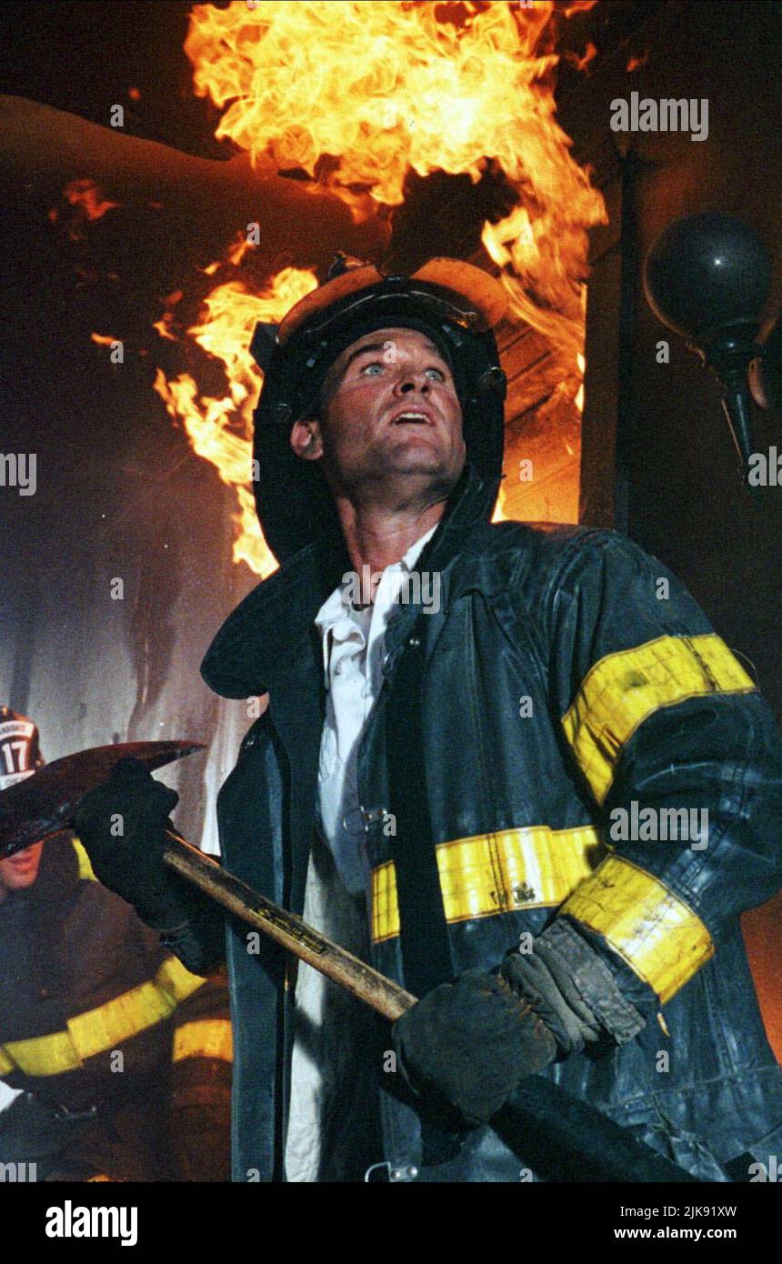 Kurt Russell Film: Backdraft (1991) Characters: Stephen 'Bull' McCaffrey  Director: Ron Howard 24 May 1991   **WARNING** This Photograph is for editorial use only and is the copyright of UNIVERSAL and/or the Photographer assigned by the Film or Production Company and can only be reproduced by publications in conjunction with the promotion of the above Film. A Mandatory Credit To UNIVERSAL is required. The Photographer should also be credited when known. No commercial use can be granted without written authority from the Film Company. Stock Photo