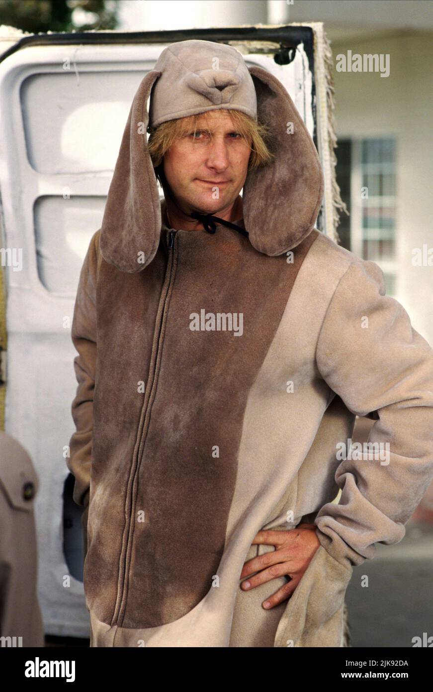 Jeff Daniels Film: Dumb & Dumber; Dumb And Dumber (USA 1994) Characters: Harry  Director: Peter Farrelly 06 December 1994   **WARNING** This Photograph is for editorial use only and is the copyright of NEW LINE CINEMA and/or the Photographer assigned by the Film or Production Company and can only be reproduced by publications in conjunction with the promotion of the above Film. A Mandatory Credit To NEW LINE CINEMA is required. The Photographer should also be credited when known. No commercial use can be granted without written authority from the Film Company. Stock Photo