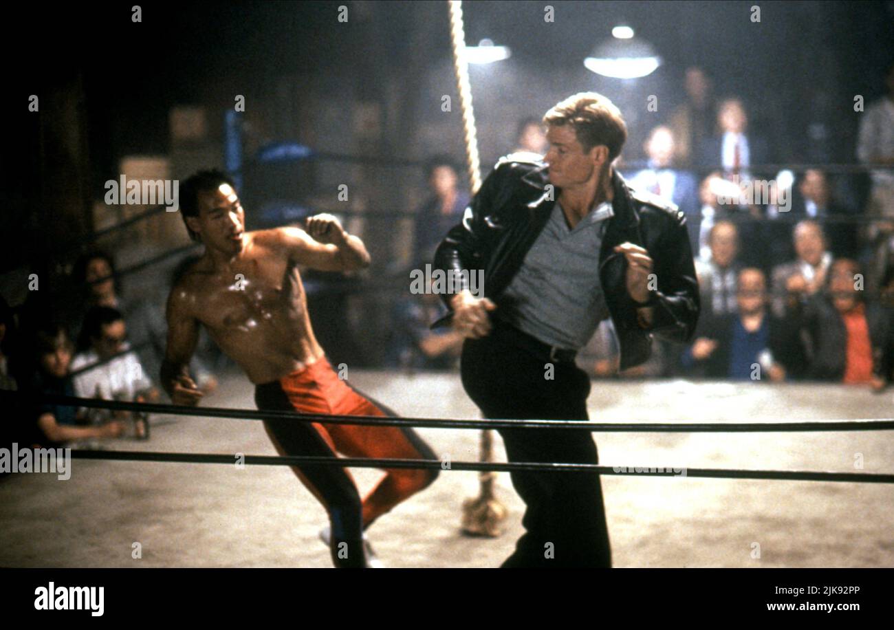 Dolph Lundgren Film: Showdown In Little Tokyo (USA 1991) Characters: Sgt. Chris Kenner  Director: Mark L. Lester 23 August 1991   **WARNING** This Photograph is for editorial use only and is the copyright of WARNER BROS. and/or the Photographer assigned by the Film or Production Company and can only be reproduced by publications in conjunction with the promotion of the above Film. A Mandatory Credit To WARNER BROS. is required. The Photographer should also be credited when known. No commercial use can be granted without written authority from the Film Company. Stock Photo