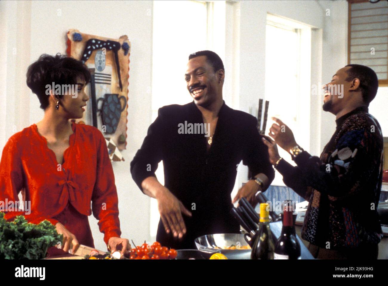 Halle Berry, Eddie Murphy & Martin Lawrence Film: Boomerang (1992) Characters: Angela, Marcus, Tyler  Director: Reginald Hudlin 01 July 1992   **WARNING** This Photograph is for editorial use only and is the copyright of PARAMOUNT and/or the Photographer assigned by the Film or Production Company and can only be reproduced by publications in conjunction with the promotion of the above Film. A Mandatory Credit To PARAMOUNT is required. The Photographer should also be credited when known. No commercial use can be granted without written authority from the Film Company. Stock Photo