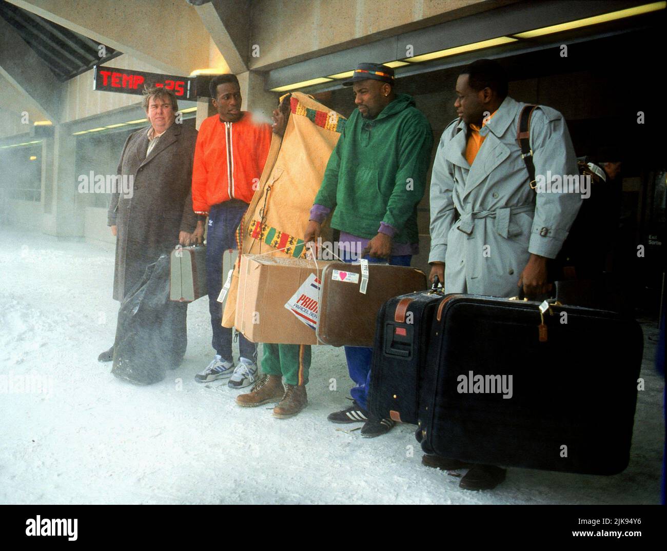 John Candy, Rawle D. Lewis, Leon Robinson, Doug E. Doug & Malik Yoba Film: Cool Runnings (USA 1993) Characters: Irving 'Irv' Blitzer,Junior Bevil,,Sanka Coffie & Yul Brenner  Director: Jon Turteltaub 01 October 1993   **WARNING** This Photograph is for editorial use only and is the copyright of DISNEY and/or the Photographer assigned by the Film or Production Company and can only be reproduced by publications in conjunction with the promotion of the above Film. A Mandatory Credit To DISNEY is required. The Photographer should also be credited when known. No commercial use can be granted withou Stock Photo