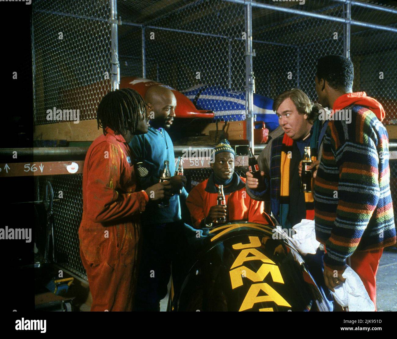 Doug E. Doug, John Candy & Leon Robinson Film: Cool Runnings (USA 1993) Characters: Sanka Coffie,Irving 'Irv' Blitzer &  Director: Jon Turteltaub 01 October 1993   **WARNING** This Photograph is for editorial use only and is the copyright of DISNEY and/or the Photographer assigned by the Film or Production Company and can only be reproduced by publications in conjunction with the promotion of the above Film. A Mandatory Credit To DISNEY is required. The Photographer should also be credited when known. No commercial use can be granted without written authority from the Film Company. Stock Photo