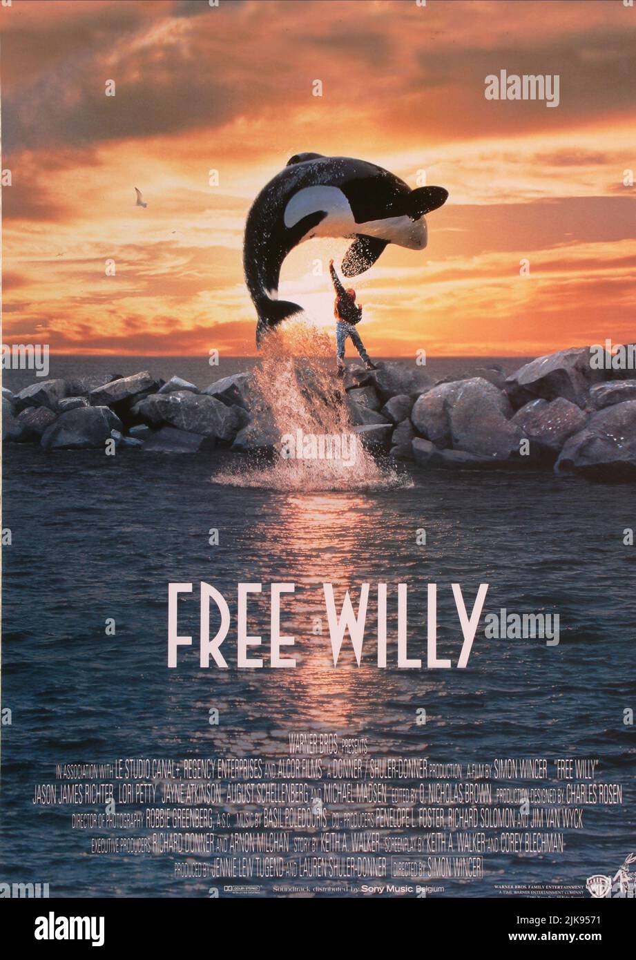 Jason James Richter Film Poster Film: Free Willy (USA/FR 1993)   Director: Simon Wincer 16 July 1993   **WARNING** This Photograph is for editorial use only and is the copyright of WARNER BROS. and/or the Photographer assigned by the Film or Production Company and can only be reproduced by publications in conjunction with the promotion of the above Film. A Mandatory Credit To WARNER BROS. is required. The Photographer should also be credited when known. No commercial use can be granted without written authority from the Film Company. Stock Photo