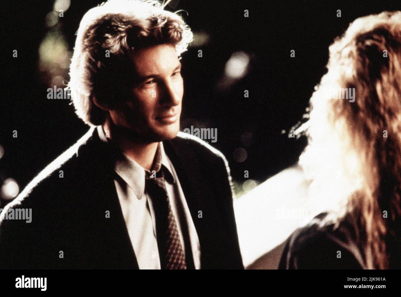 Richard Gere Film: Final Analysis (1992) Characters: Dr. Isaac Barr  Director: Phil Joanou 07 February 1992   **WARNING** This Photograph is for editorial use only and is the copyright of WARNER BROS and/or the Photographer assigned by the Film or Production Company and can only be reproduced by publications in conjunction with the promotion of the above Film. A Mandatory Credit To WARNER BROS is required. The Photographer should also be credited when known. No commercial use can be granted without written authority from the Film Company. Stock Photo