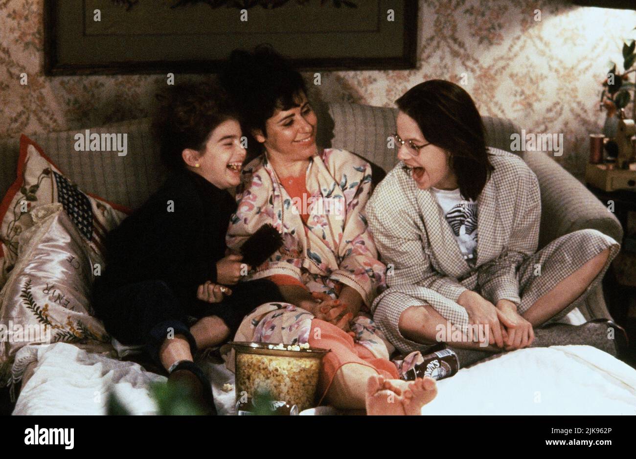 Gaby Hoffmann, Julie Kavner & Samantha Mathis Film: This Is My Life (1992) Characters: Opal Ingels,Dottie Ingels & Erica Ingels  Director: Nora Ephron 21 February 1992   **WARNING** This Photograph is for editorial use only and is the copyright of 20 CENTURY FOX and/or the Photographer assigned by the Film or Production Company and can only be reproduced by publications in conjunction with the promotion of the above Film. A Mandatory Credit To 20 CENTURY FOX is required. The Photographer should also be credited when known. No commercial use can be granted without written authority from the Fil Stock Photo