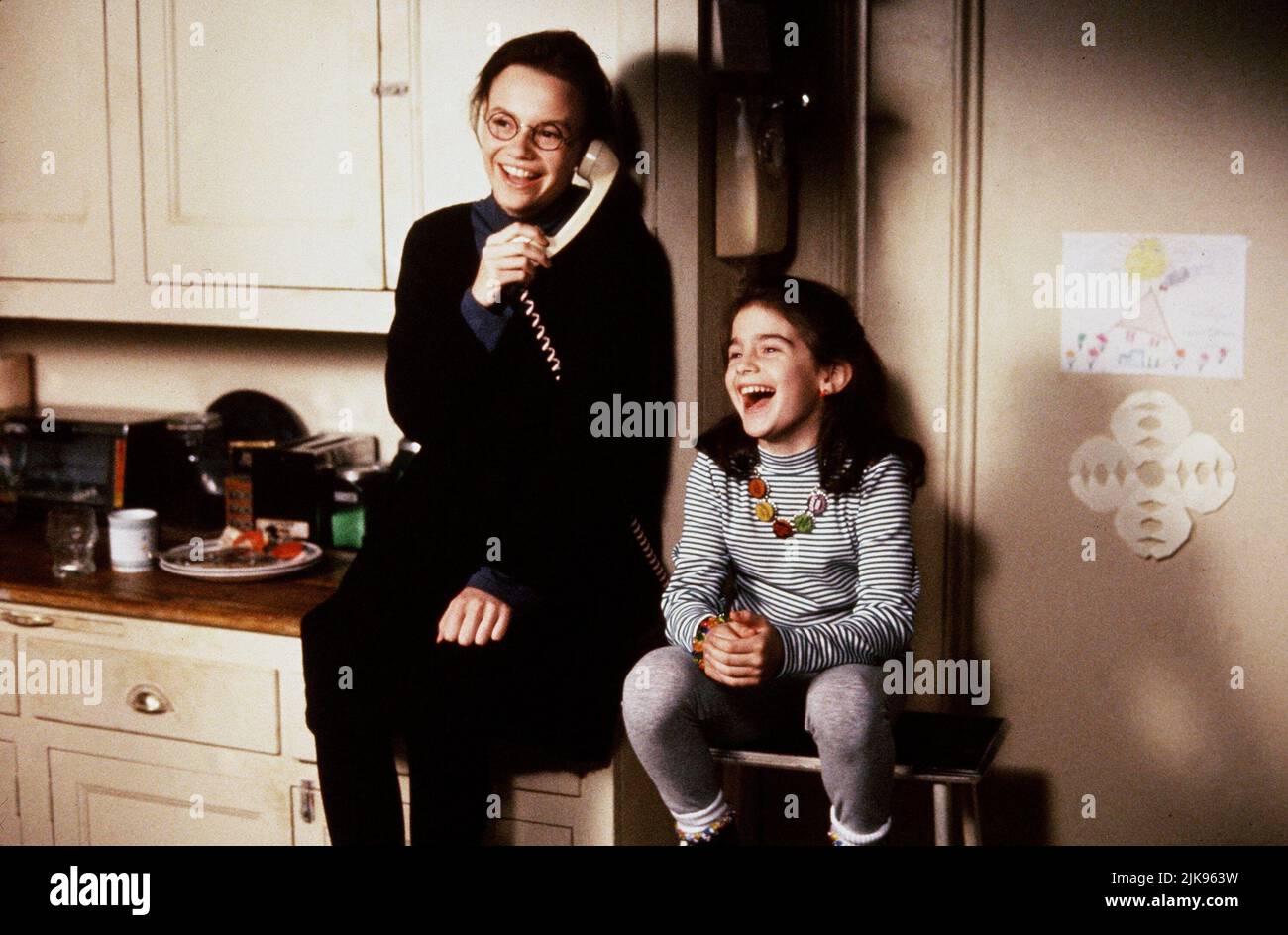 Samantha Mathis & Gaby Hoffmann Film: This Is My Life (1992) Characters: Erica Ingels & Opal Ingels  Director: Nora Ephron 21 February 1992   **WARNING** This Photograph is for editorial use only and is the copyright of 20 CENTURY FOX and/or the Photographer assigned by the Film or Production Company and can only be reproduced by publications in conjunction with the promotion of the above Film. A Mandatory Credit To 20 CENTURY FOX is required. The Photographer should also be credited when known. No commercial use can be granted without written authority from the Film Company. Stock Photo