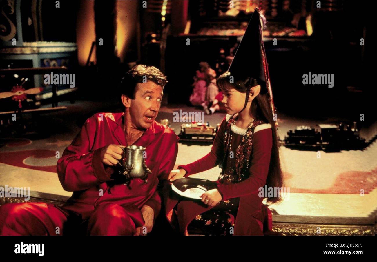 Tim Allen & Paige Tamada Film: The Santa Clause (USA 1994) Characters: Scott Calvin & Judy the Elf  Director: John Pasquin 11 November 1994   **WARNING** This Photograph is for editorial use only and is the copyright of DISNEY and/or the Photographer assigned by the Film or Production Company and can only be reproduced by publications in conjunction with the promotion of the above Film. A Mandatory Credit To DISNEY is required. The Photographer should also be credited when known. No commercial use can be granted without written authority from the Film Company. Stock Photo