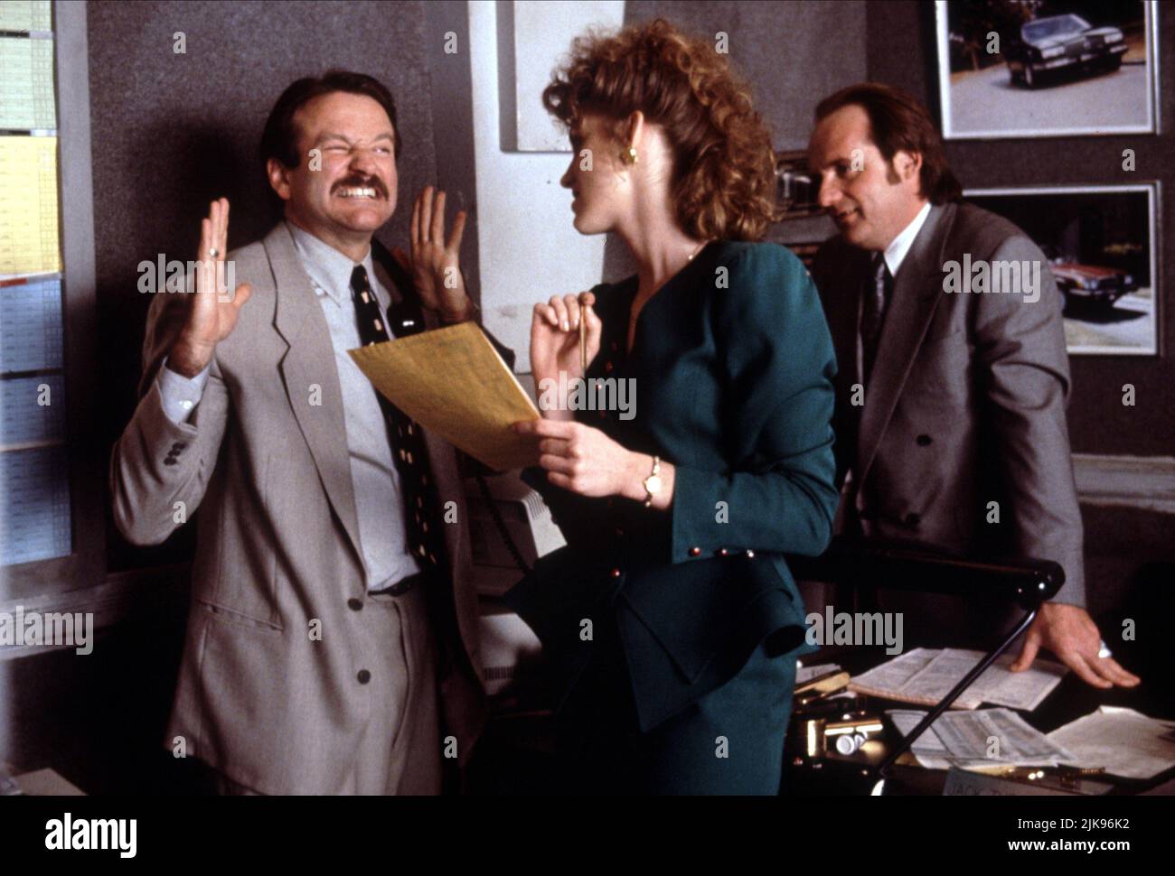 Scene With Robin Williams Film: Cadillac Man (1992) Characters: WITH Joey O'Brien  Director: Roger Donaldson 18 May 1990   **WARNING** This Photograph is for editorial use only and is the copyright of ORION and/or the Photographer assigned by the Film or Production Company and can only be reproduced by publications in conjunction with the promotion of the above Film. A Mandatory Credit To ORION is required. The Photographer should also be credited when known. No commercial use can be granted without written authority from the Film Company. Stock Photo
