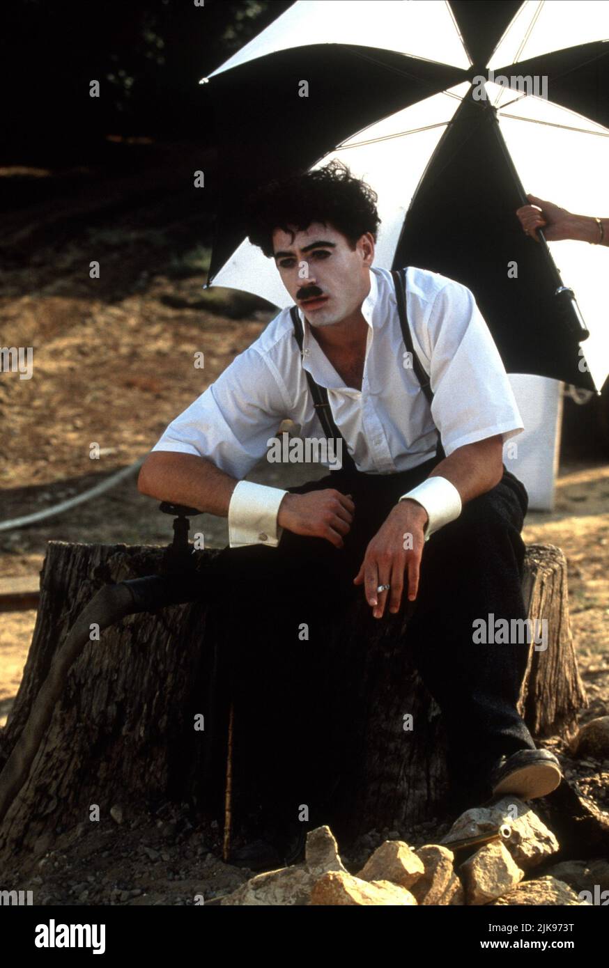 Robert Downey Jr. Film: Chaplin (USA/UK/FR/IT/JP 1992) Characters: CHARLES SPENCER CHAPLIN  Director: Richard Attenborough 16 December 1992   **WARNING** This Photograph is for editorial use only and is the copyright of CAROLCO PICTURES and/or the Photographer assigned by the Film or Production Company and can only be reproduced by publications in conjunction with the promotion of the above Film. A Mandatory Credit To CAROLCO PICTURES is required. The Photographer should also be credited when known. No commercial use can be granted without written authority from the Film Company. Stock Photo