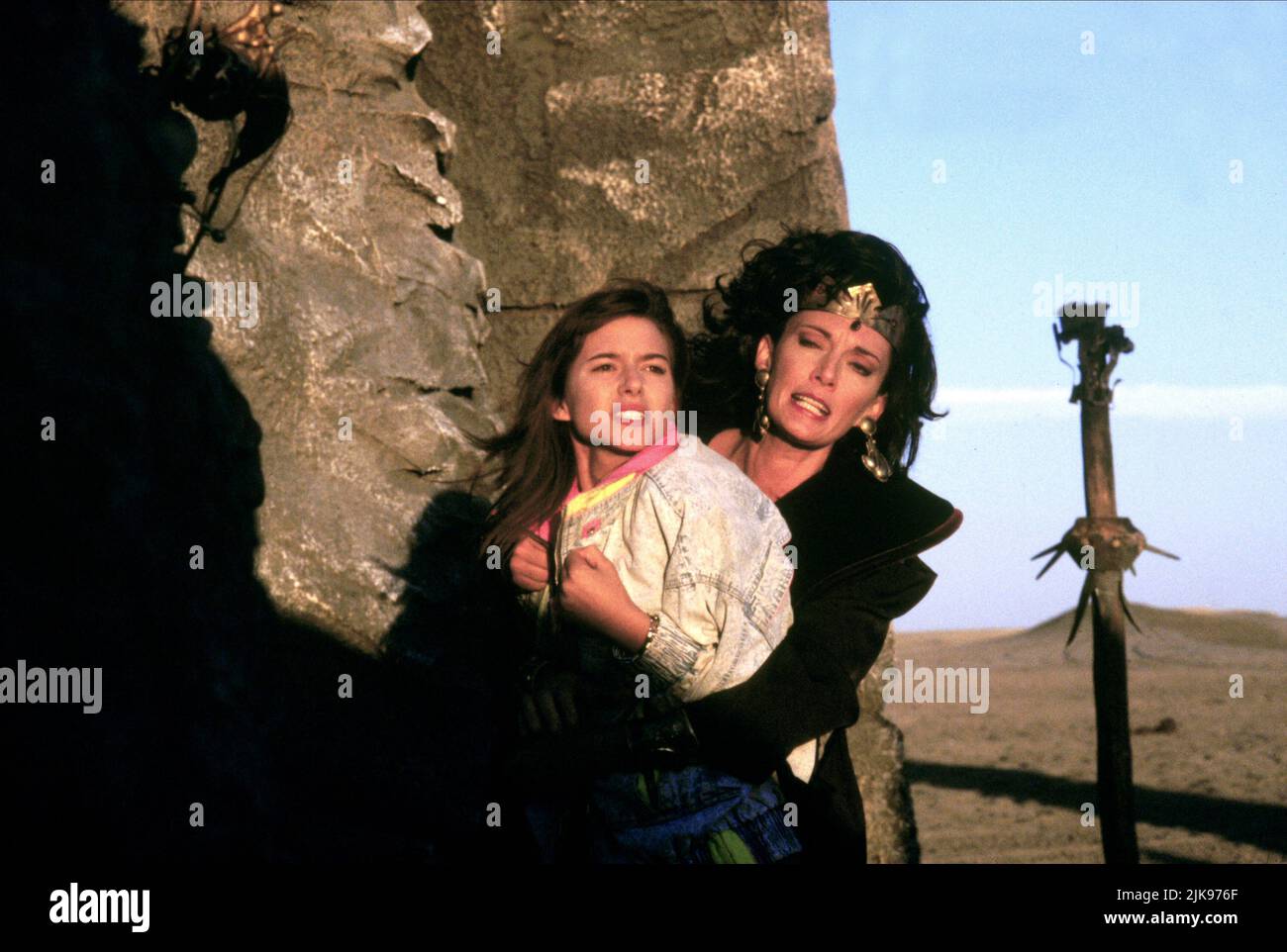 Kari Wuhrer & Sarah Douglas Film: Beastmaster 2: Through The Portal Of Time (1991) Characters: Jackie Trent, Lyranna  Director: Sylvio Tabet 23 August 1991   **WARNING** This Photograph is for editorial use only and is the copyright of FILMS 21 and/or the Photographer assigned by the Film or Production Company and can only be reproduced by publications in conjunction with the promotion of the above Film. A Mandatory Credit To FILMS 21 is required. The Photographer should also be credited when known. No commercial use can be granted without written authority from the Film Company. Stock Photo