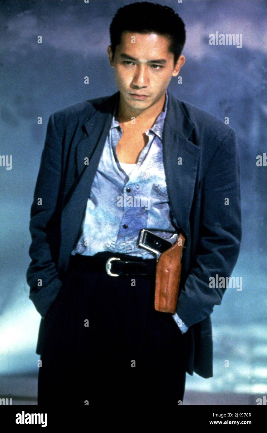 Tony Leung Chiu Wai Film: Hard Boiled; Lat Sau San Taam (Lat sau san taam) Characters: Tony  Hk 1992, Director: John Woo 16 April 1992   **WARNING** This Photograph is for editorial use only and is the copyright of MILESTONE PICTURES and/or the Photographer assigned by the Film or Production Company and can only be reproduced by publications in conjunction with the promotion of the above Film. A Mandatory Credit To MILESTONE PICTURES is required. The Photographer should also be credited when known. No commercial use can be granted without written authority from the Film Company. Stock Photo