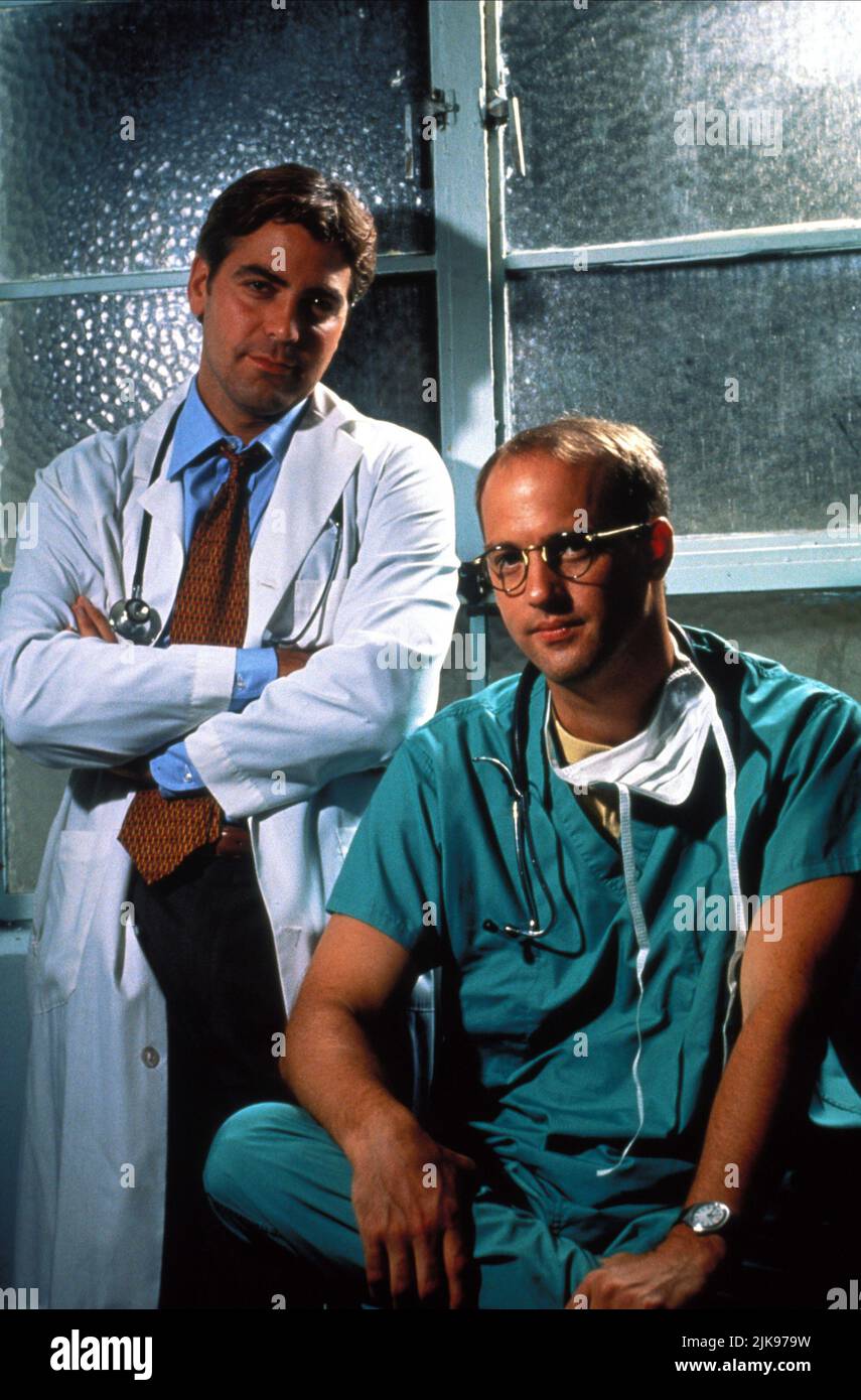 George Clooney & Anthony Edwards Television: Er : Season 1; E.R. (TV-Serie) Characters: Dr. Doug Ross, Dr. Mark Greene  Usa 1994-2000, / 1. Staffel, Season 1 19 September 1994   **WARNING** This Photograph is for editorial use only and is the copyright of WARNER BROS. TELEVISION and/or the Photographer assigned by the Film or Production Company and can only be reproduced by publications in conjunction with the promotion of the above Film. A Mandatory Credit To WARNER BROS. TELEVISION is required. The Photographer should also be credited when known. No commercial use can be granted without writ Stock Photo