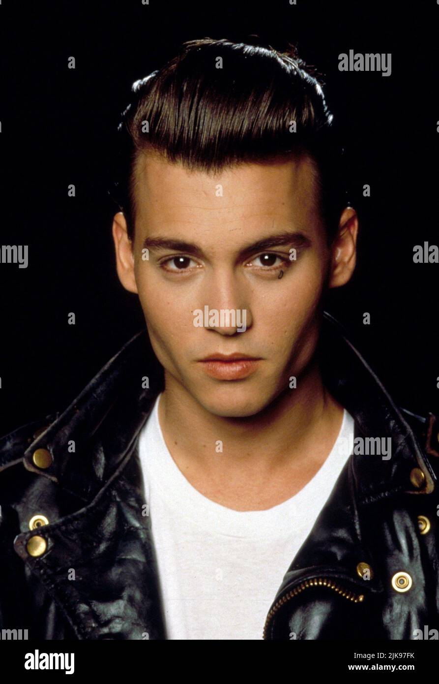 Johnny Depp Film: Cry-Baby; Cry Baby (1990) Characters: Wade 'Cry-Baby' Walker  Director: John Waters 06 April 1990   **WARNING** This Photograph is for editorial use only and is the copyright of UNIVERSAL and/or the Photographer assigned by the Film or Production Company and can only be reproduced by publications in conjunction with the promotion of the above Film. A Mandatory Credit To UNIVERSAL is required. The Photographer should also be credited when known. No commercial use can be granted without written authority from the Film Company. Stock Photo