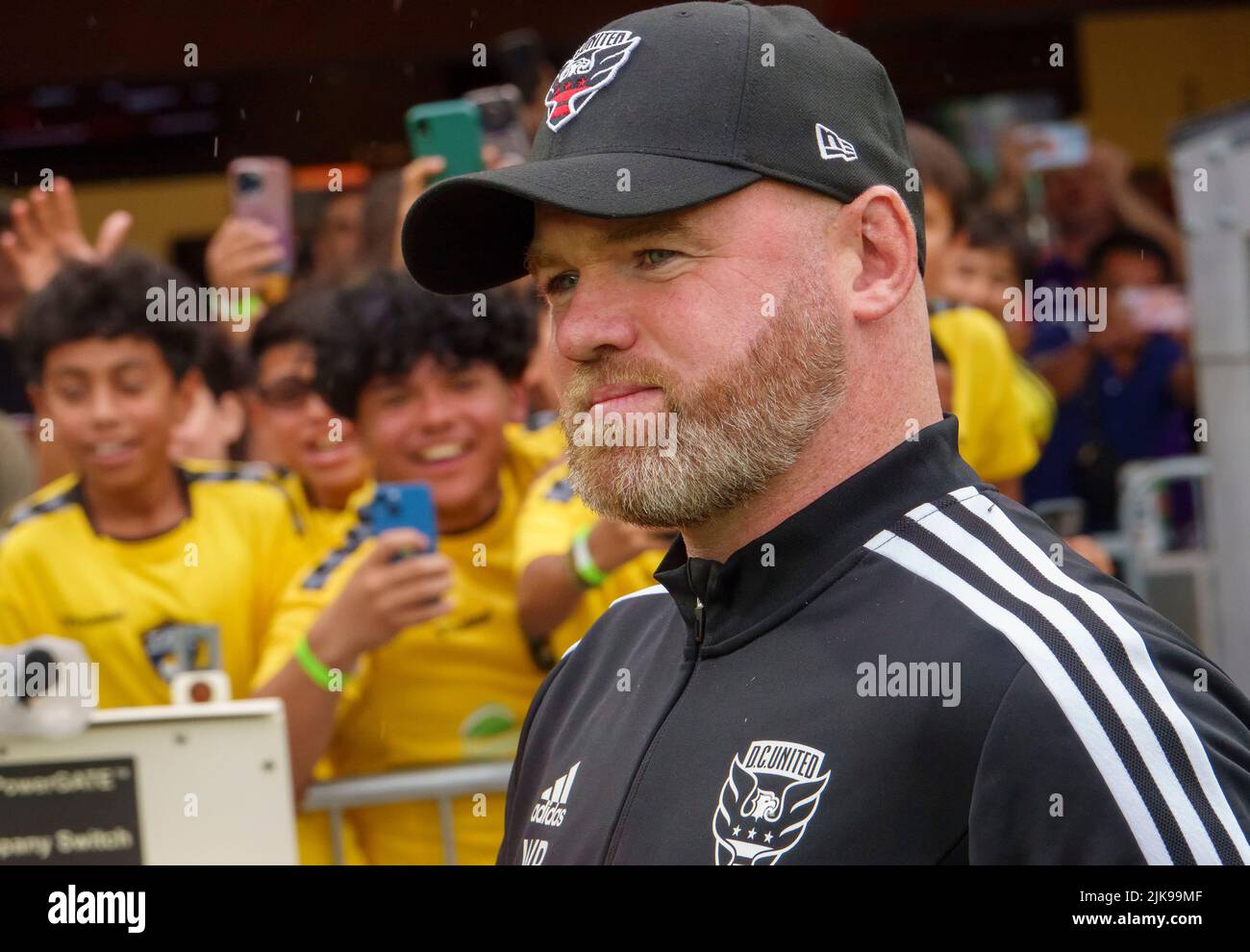 WASHINGTON, DC, USA - 31 JULY 2022: Head coach Wayne Rooney enters the pitch before his first game as D.C United coach before a MLS match between D.C United and the Orlando City SC, on July 31, 2022, at Audi Field, in Washington, DC. (Photo by Tony Quinn-Alamy Live News) Stock Photo