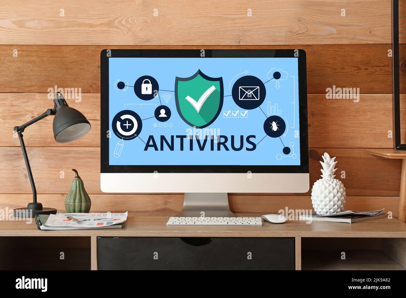 Modern computer at workplace. Antivirus concept Stock Photo - Alamy
