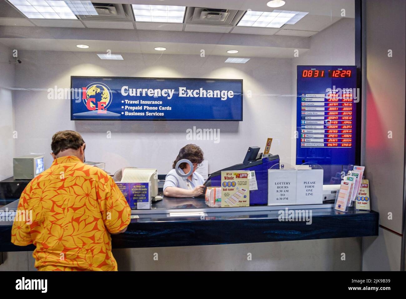 Houston Texas,George Bush Intercontinental Airport,currency money exchange window service cambio travel insurance,traveling people person scene Stock Photo