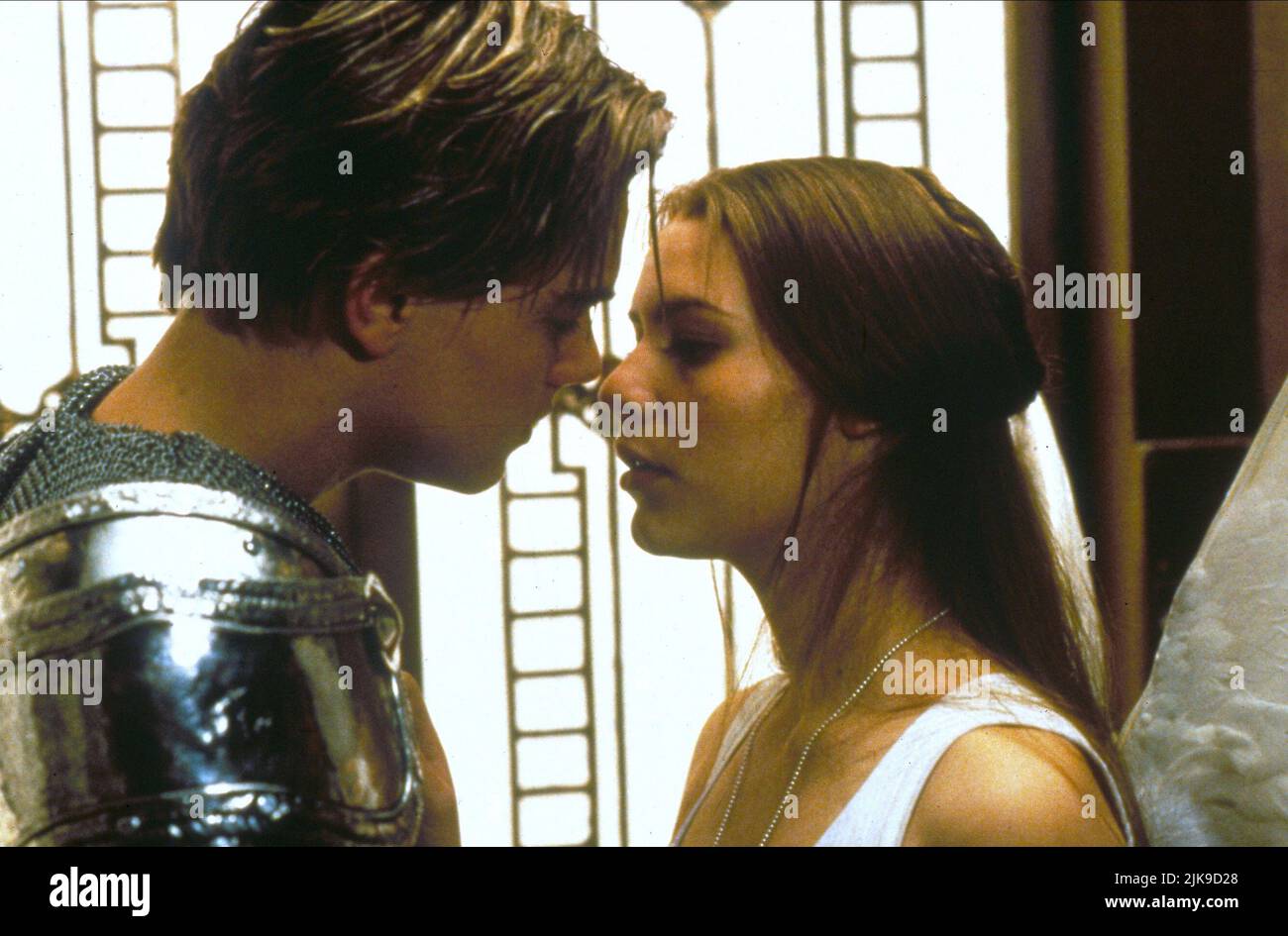 Leonardo Dicaprio & Claire Danes Film: Romeo + Juliet; Romeo And Juliet (USA 1996)   Director: Baz Luhrmann 01 November 1996   **WARNING** This Photograph is for editorial use only and is the copyright of 20TH CENTURY FOX and/or the Photographer assigned by the Film or Production Company and can only be reproduced by publications in conjunction with the promotion of the above Film. A Mandatory Credit To 20TH CENTURY FOX is required. The Photographer should also be credited when known. No commercial use can be granted without written authority from the Film Company. Stock Photo