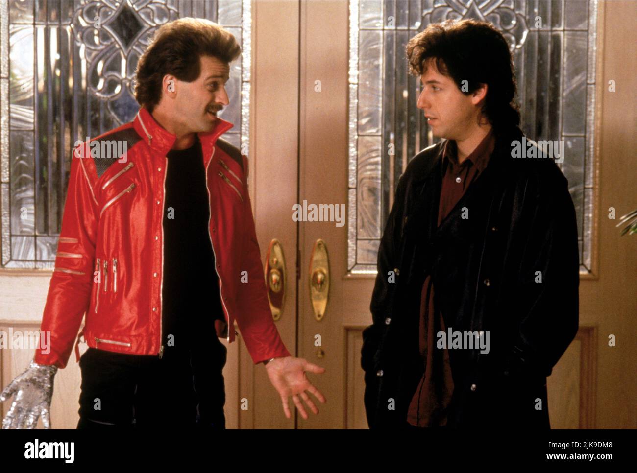 Allen Covert & Adam Sandler Film: The Wedding Singer (USA 1998) Characters: Sammy, Robbie  Director: Frank Coraci 12 February 1998   **WARNING** This Photograph is for editorial use only and is the copyright of NEW LINE CINEMA and/or the Photographer assigned by the Film or Production Company and can only be reproduced by publications in conjunction with the promotion of the above Film. A Mandatory Credit To NEW LINE CINEMA is required. The Photographer should also be credited when known. No commercial use can be granted without written authority from the Film Company. Stock Photo