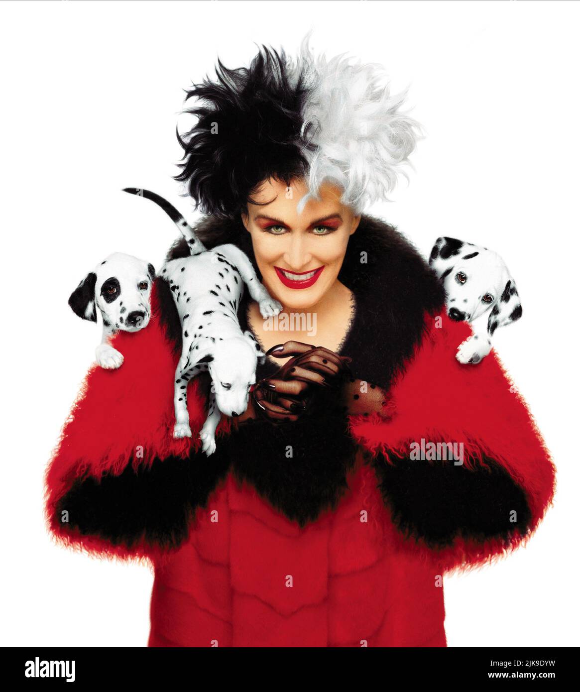 Glenn Close & Puppies Film: 101 Dalmatians (1996) Characters: Cruella De Vil  Director: Stephen Herek 18 November 1996   **WARNING** This Photograph is for editorial use only and is the copyright of WALT DISNEY and/or the Photographer assigned by the Film or Production Company and can only be reproduced by publications in conjunction with the promotion of the above Film. A Mandatory Credit To WALT DISNEY is required. The Photographer should also be credited when known. No commercial use can be granted without written authority from the Film Company. Stock Photo