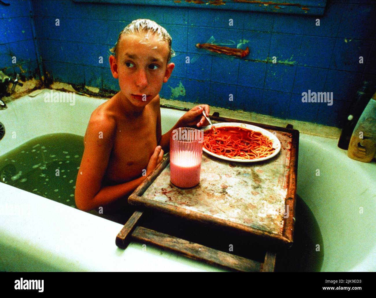 Jacob Reynolds Film: Gummo (1997) Characters: Solomon  Director: Harmony Korine 29 August 1997   **WARNING** This Photograph is for editorial use only and is the copyright of FINE LINE FEATURES and/or the Photographer assigned by the Film or Production Company and can only be reproduced by publications in conjunction with the promotion of the above Film. A Mandatory Credit To FINE LINE FEATURES is required. The Photographer should also be credited when known. No commercial use can be granted without written authority from the Film Company. Stock Photo