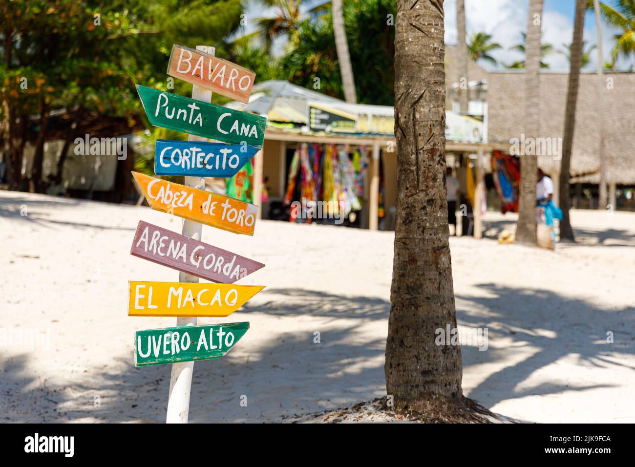 Dominican Republic Bavaro Punta cana provinces La Altagracia. Wooden pillar with signposts directions Stock Photo