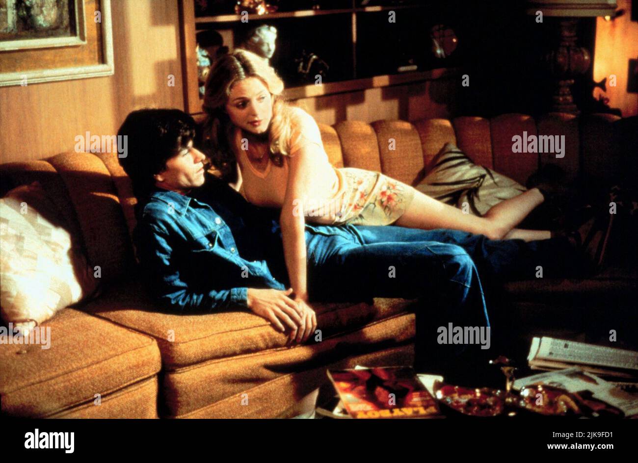 Mark Wahlberg & Julianne Moore Film: Boogie Nights (USA 1997) Characters: Eddie Adams - Dirk Diggler & Amber Waves  Director: Paul Thomas Anderson 11 September 1997   **WARNING** This Photograph is for editorial use only and is the copyright of NEW LINE CINEMA and/or the Photographer assigned by the Film or Production Company and can only be reproduced by publications in conjunction with the promotion of the above Film. A Mandatory Credit To NEW LINE CINEMA is required. The Photographer should also be credited when known. No commercial use can be granted without written authority from the Film Stock Photo