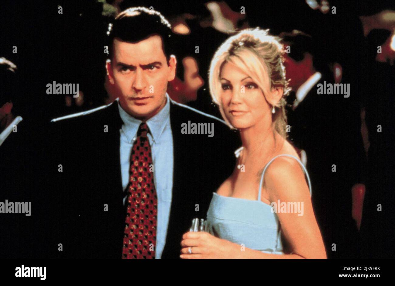 Charlie Sheen,Heather Locklear Film: Money Talks (1997) Characters: James Russell,Grace Cipriani