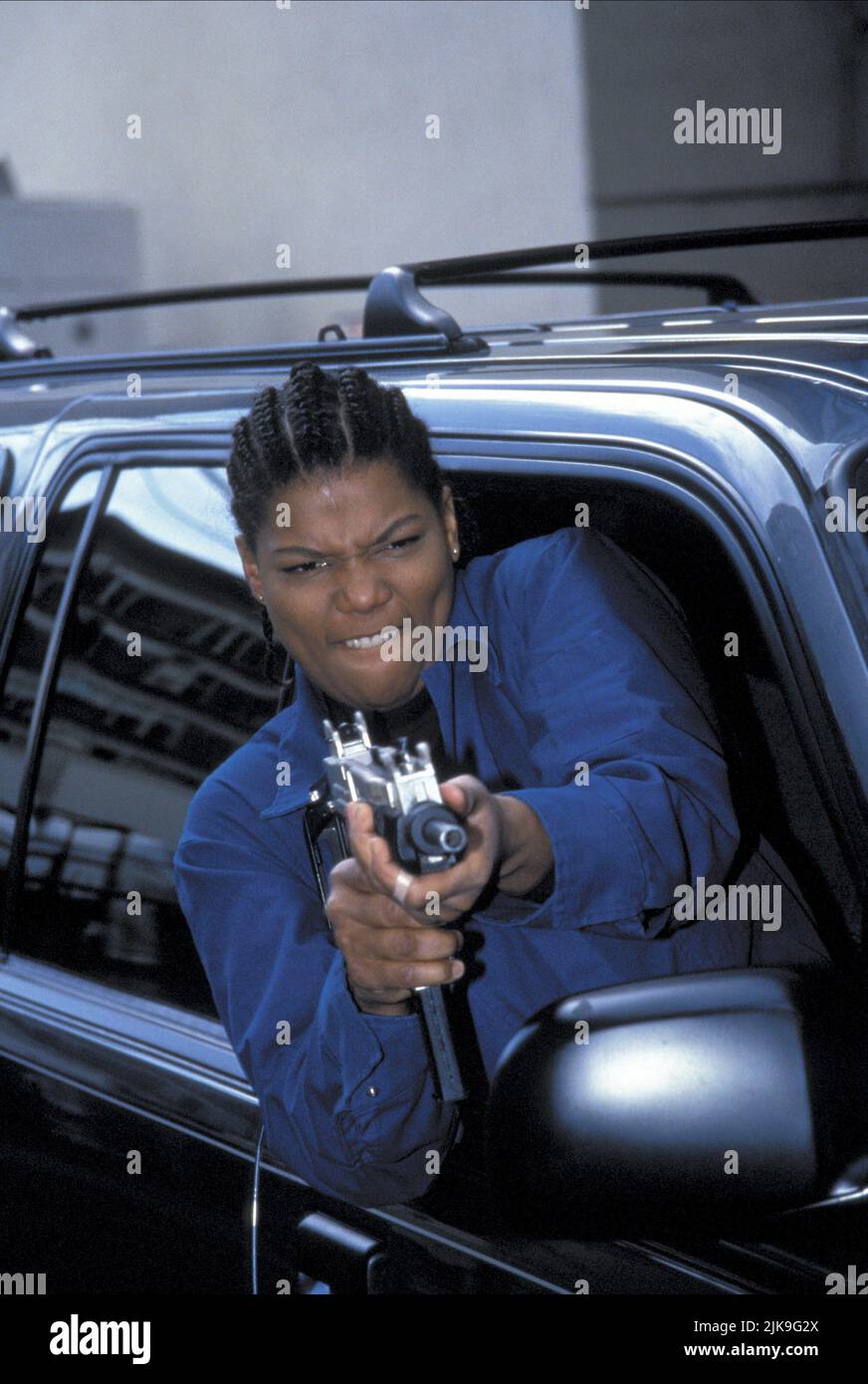 Queen Latifah Film: Set It Off (1996) Characters: Cleopatra 'Cleo' Sims  Director: F. Gary Gray 06 November 1996   **WARNING** This Photograph is for editorial use only and is the copyright of NEW LINE CINEMA and/or the Photographer assigned by the Film or Production Company and can only be reproduced by publications in conjunction with the promotion of the above Film. A Mandatory Credit To NEW LINE CINEMA is required. The Photographer should also be credited when known. No commercial use can be granted without written authority from the Film Company. Stock Photo