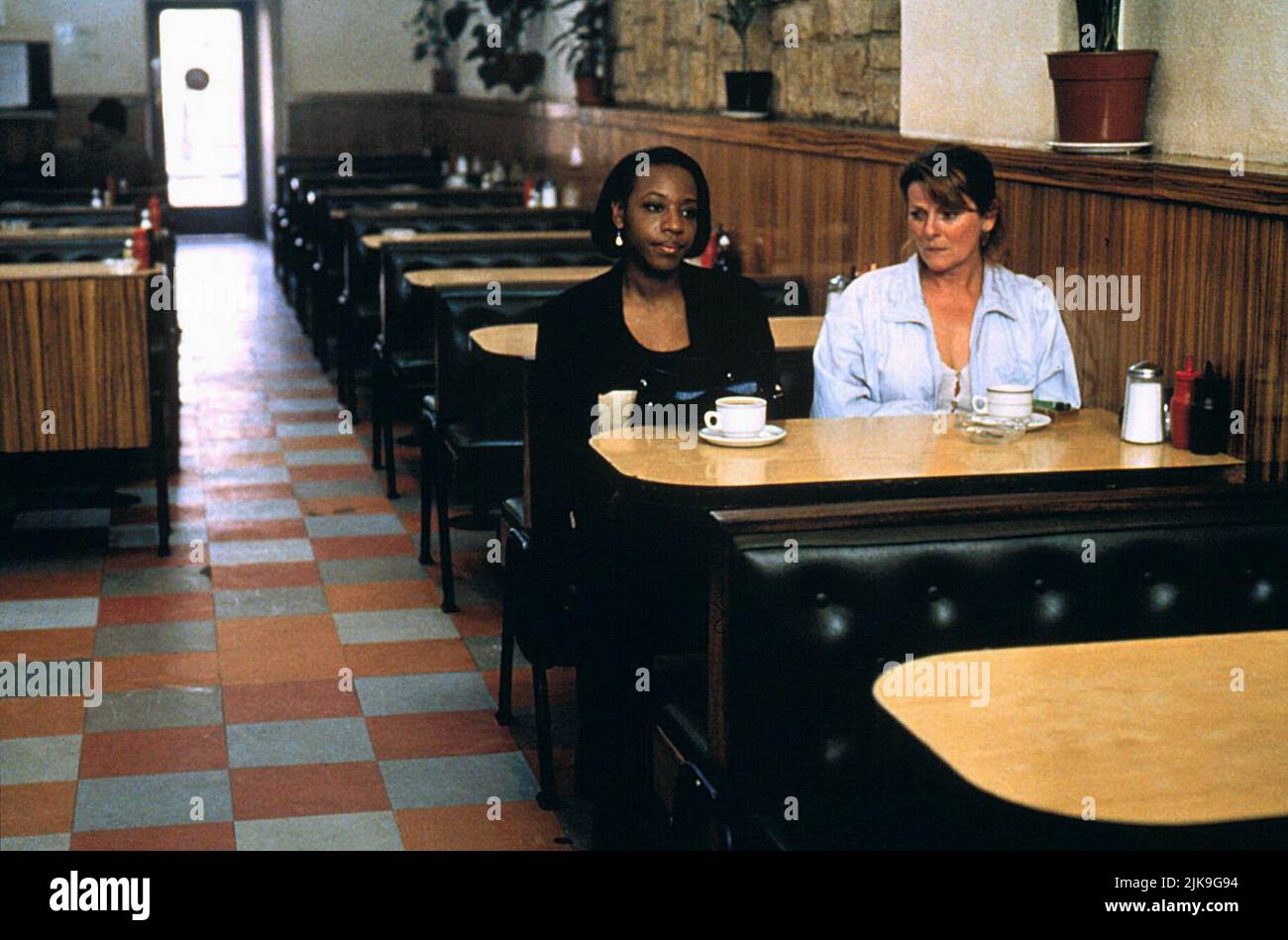 Marianne Jean-Baptiste & Brenda Blethyn Film: Secrets & Lies (1996) Characters: Hortense Cumberbatch & Cynthia Rose Purley  Director: Mike Leigh 24 May 1996   **WARNING** This Photograph is for editorial use only and is the copyright of WARNER BROS and/or the Photographer assigned by the Film or Production Company and can only be reproduced by publications in conjunction with the promotion of the above Film. A Mandatory Credit To WARNER BROS is required. The Photographer should also be credited when known. No commercial use can be granted without written authority from the Film Company. Stock Photo