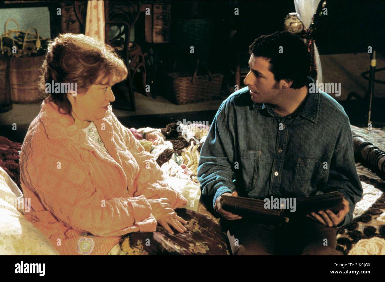 Kathy Bates & Adam Sandler Film: The Waterboy (1998) Characters: Helen 'Mama' Boucher & Robert 'Bobby' Boucher Jr.  Director: Frank Coraci 06 November 1998   **WARNING** This Photograph is for editorial use only and is the copyright of TOUCHSTONE and/or the Photographer assigned by the Film or Production Company and can only be reproduced by publications in conjunction with the promotion of the above Film. A Mandatory Credit To TOUCHSTONE is required. The Photographer should also be credited when known. No commercial use can be granted without written authority from the Film Company. Stock Photo