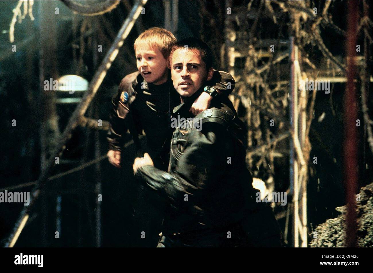 Jack Johnson & Matt Leblanc Film: Lost In Space (USA 1998) Characters: Will Robinson & Maj. Don West  Director: Stephen Hopkins 03 April 1998   **WARNING** This Photograph is for editorial use only and is the copyright of NEW LINE CINEMA and/or the Photographer assigned by the Film or Production Company and can only be reproduced by publications in conjunction with the promotion of the above Film. A Mandatory Credit To NEW LINE CINEMA is required. The Photographer should also be credited when known. No commercial use can be granted without written authority from the Film Company. Stock Photo