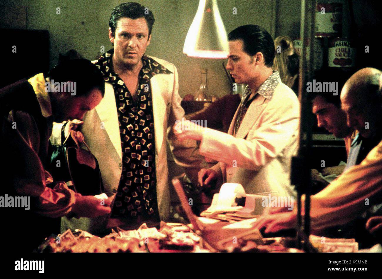 Michael Madsen & Johnny Depp Film: Donnie Brasco (1997) Characters: Sonny Black & Donnie Brasco  Director: Mike Newell 28 February 1997   **WARNING** This Photograph is for editorial use only and is the copyright of TRISTAR and/or the Photographer assigned by the Film or Production Company and can only be reproduced by publications in conjunction with the promotion of the above Film. A Mandatory Credit To TRISTAR is required. The Photographer should also be credited when known. No commercial use can be granted without written authority from the Film Company. Stock Photo
